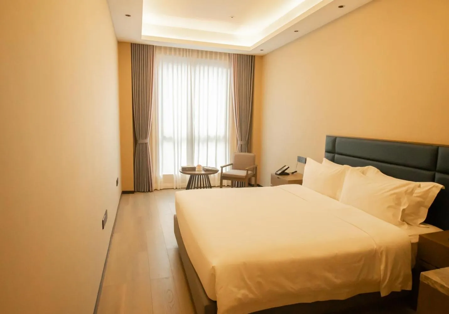 Photo of the whole room, Bed in DongHu Resort Hotel