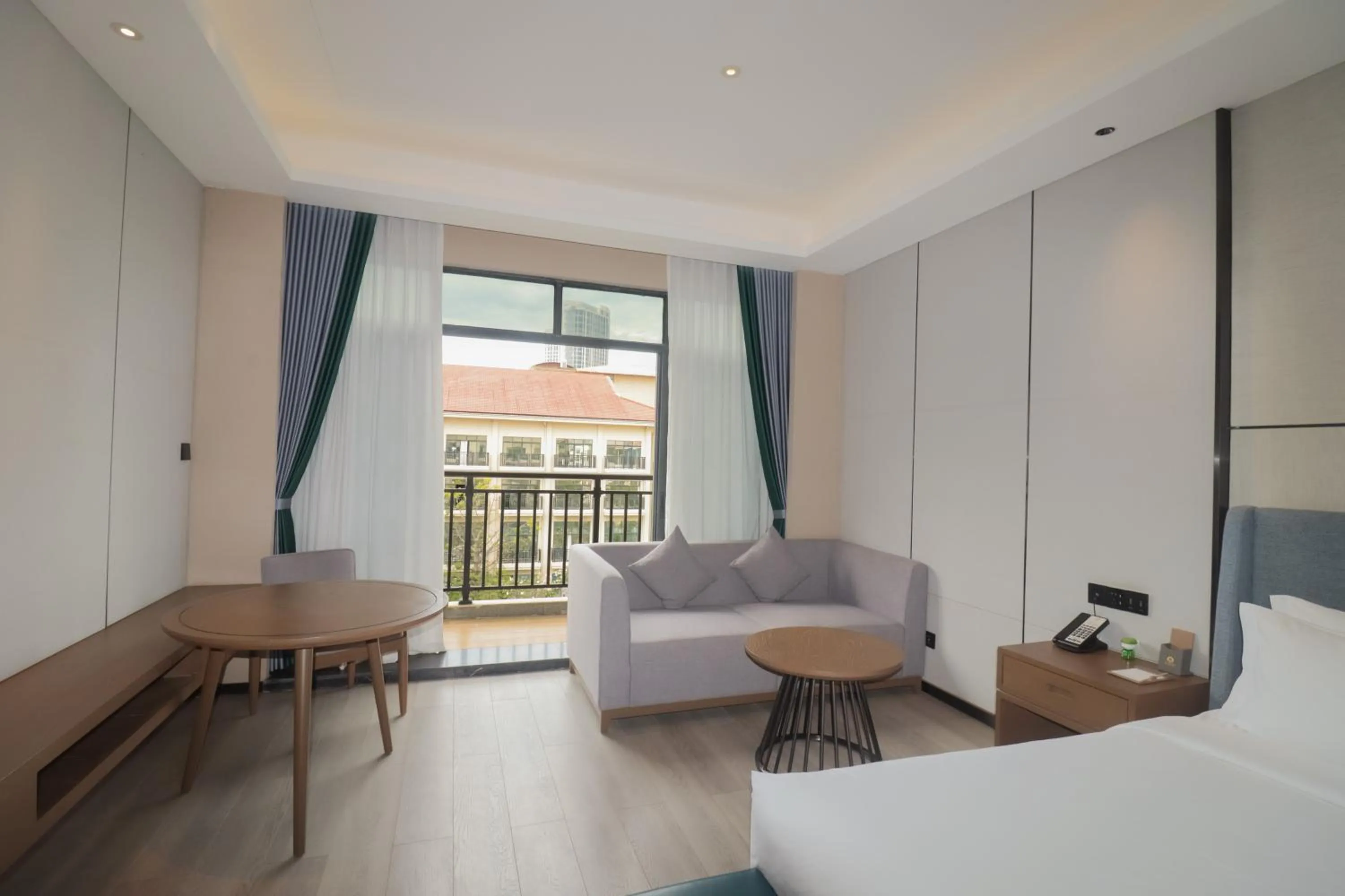 Seating area, Bed in DongHu Resort Hotel