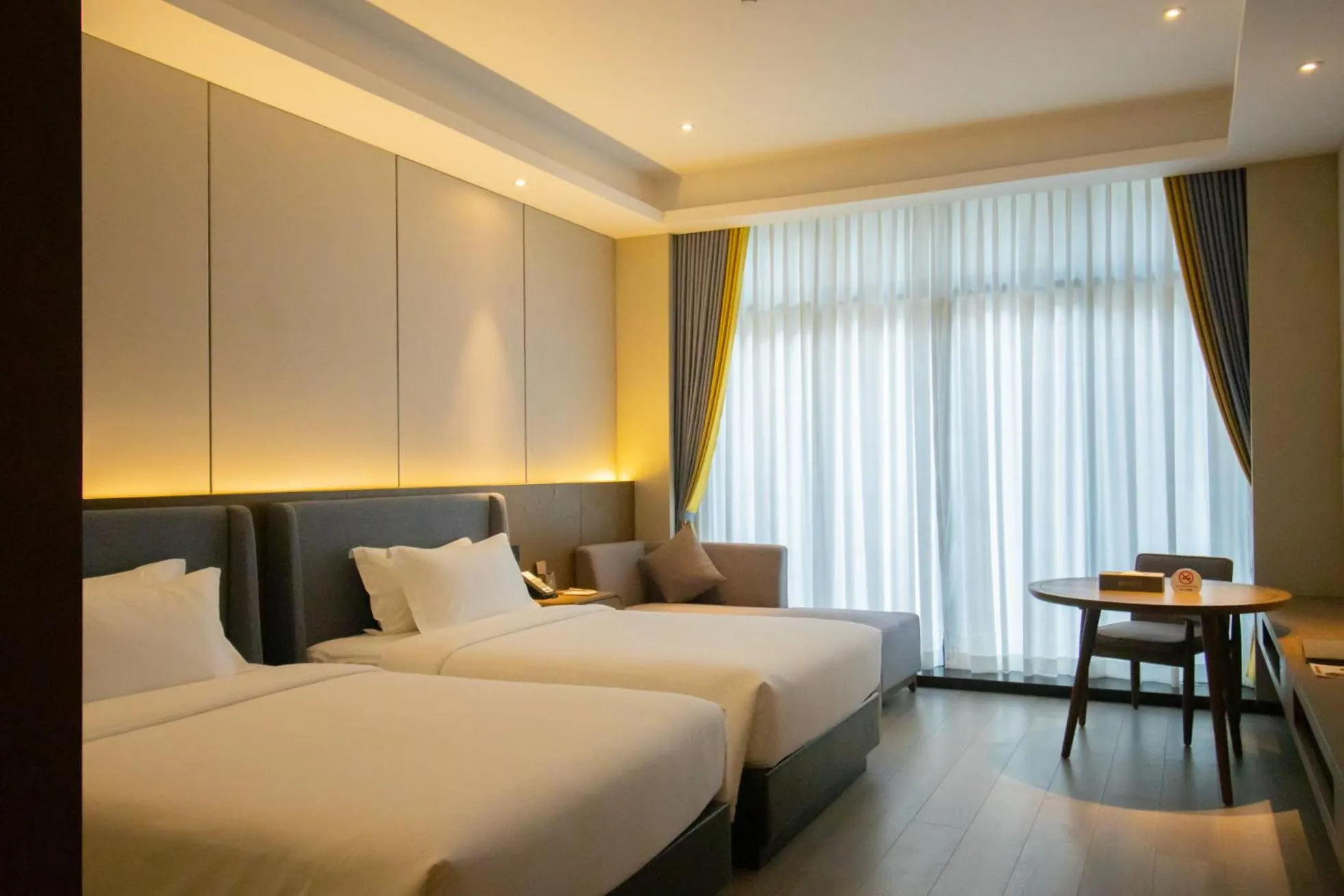 Photo of the whole room, Bed in DongHu Resort Hotel