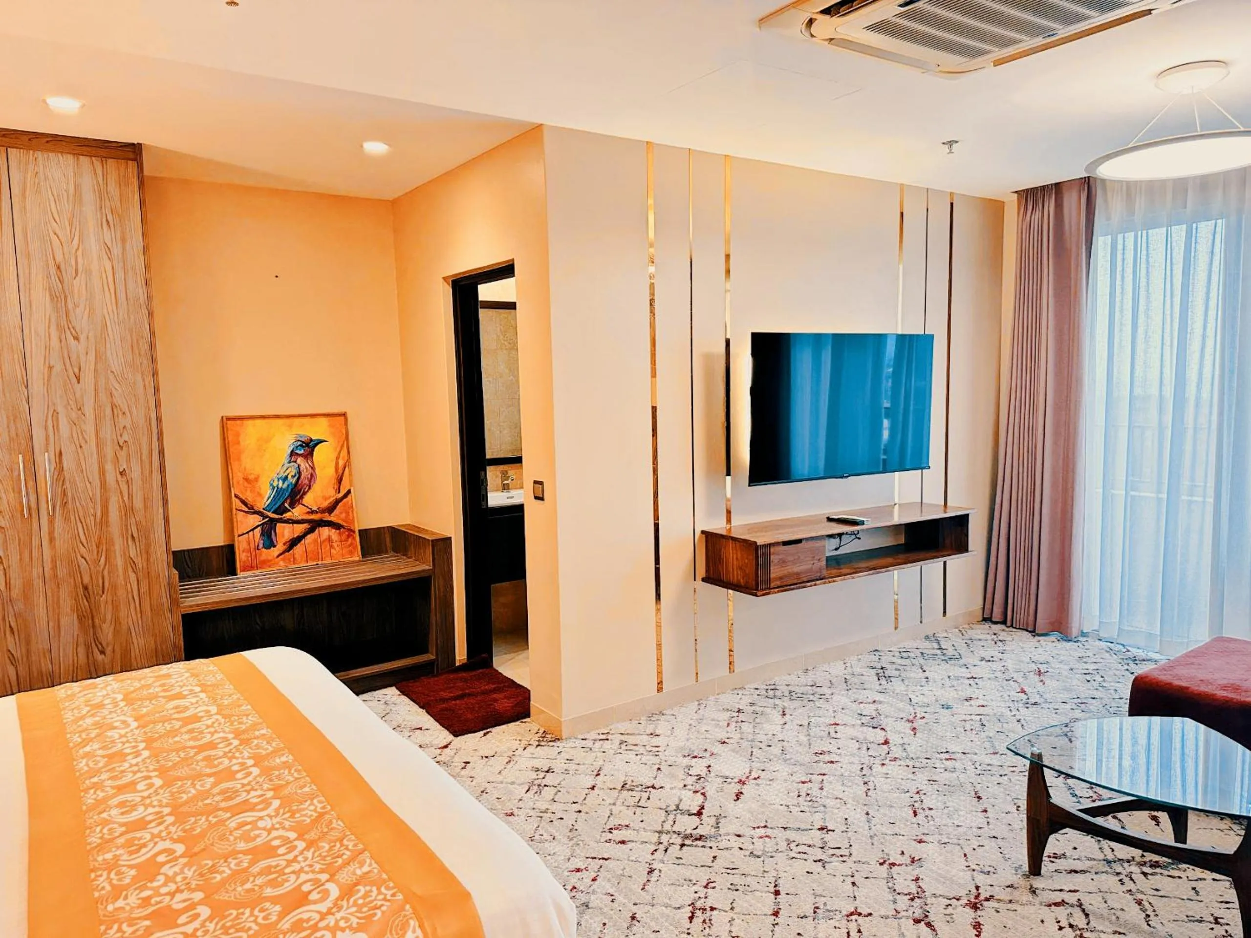 Communal lounge/ TV room, Bed in Kingjada Hotels & Apartments