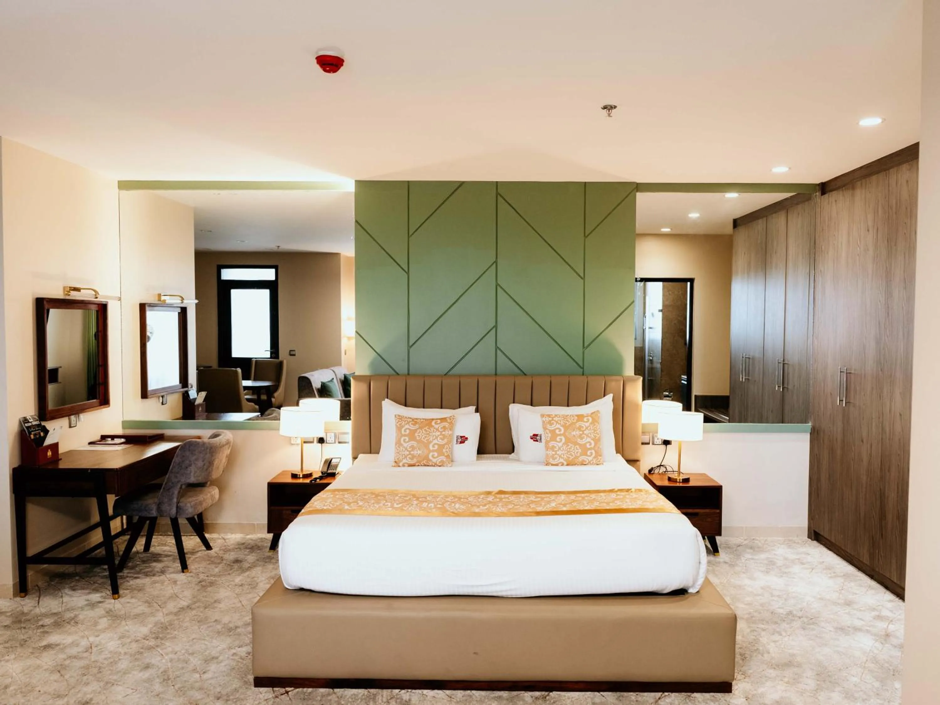 Seating area, Bed in Kingjada Hotels & Apartments