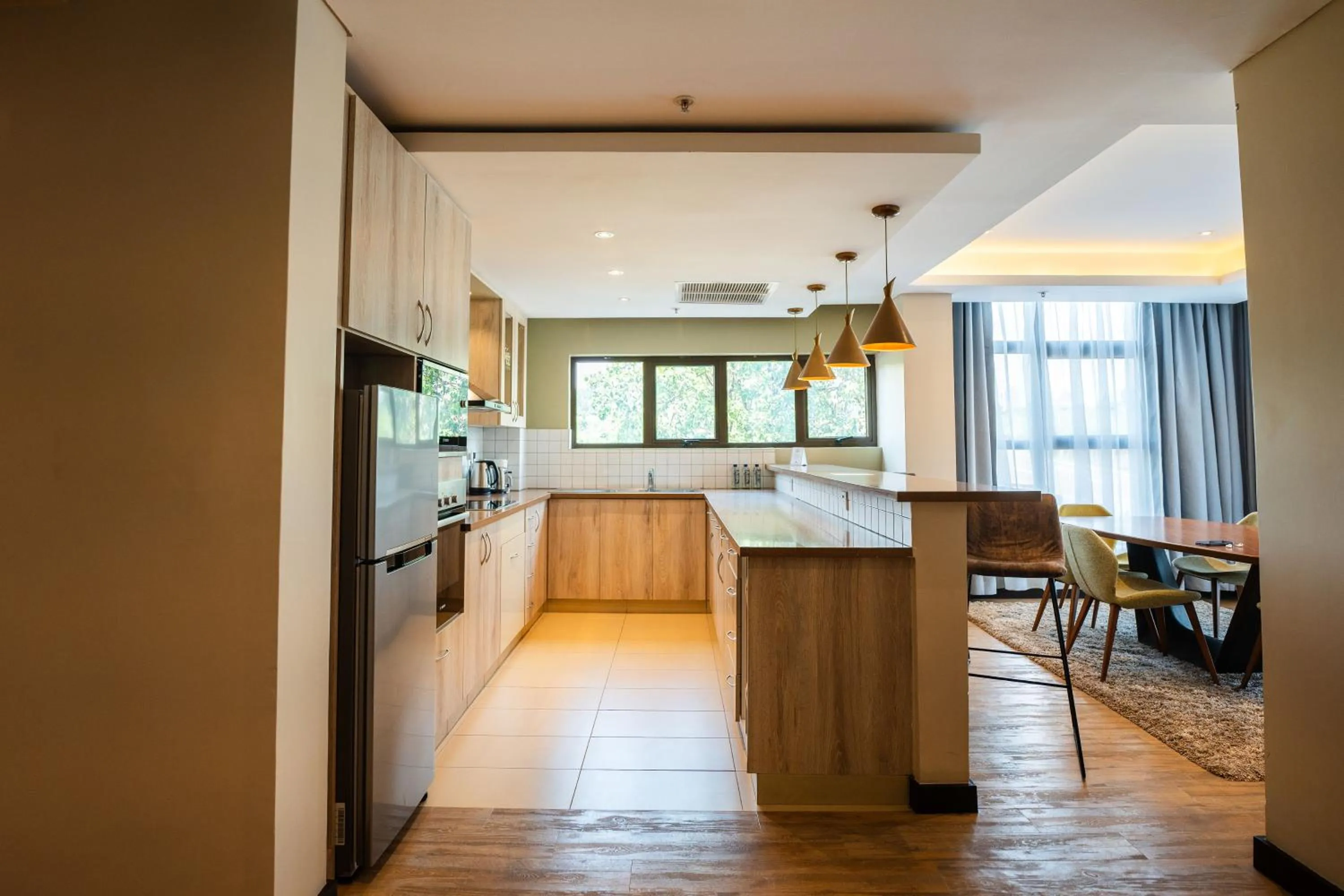 kitchen in Trademark Suites at Enaki Town