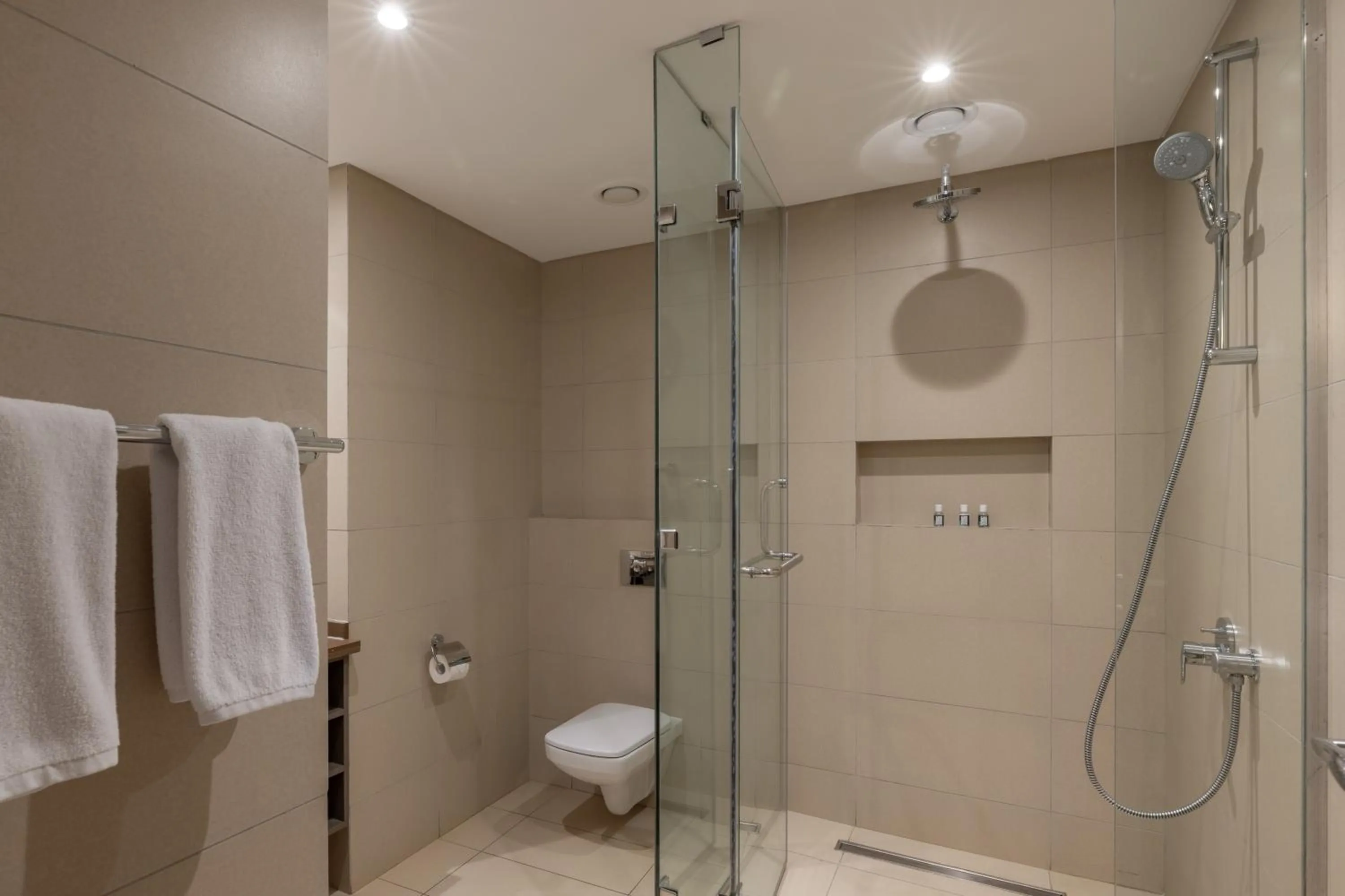 Bathroom in Trademark Suites at Enaki Town