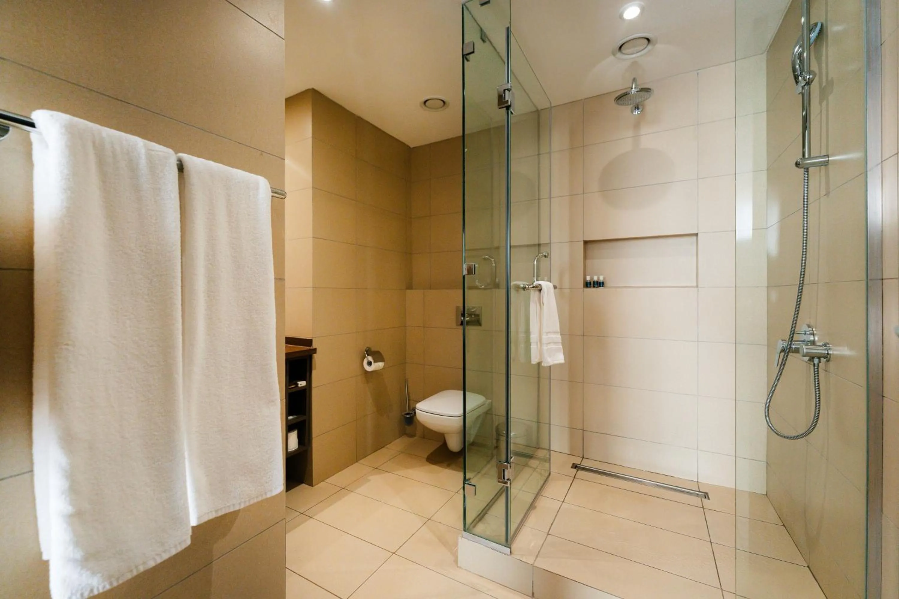 Bathroom in Trademark Suites at Enaki Town