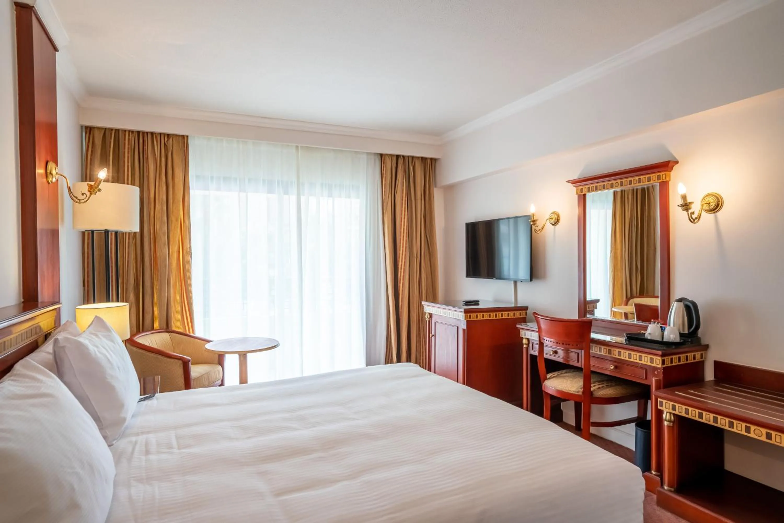 Bed in Azal Pyramids Hotel