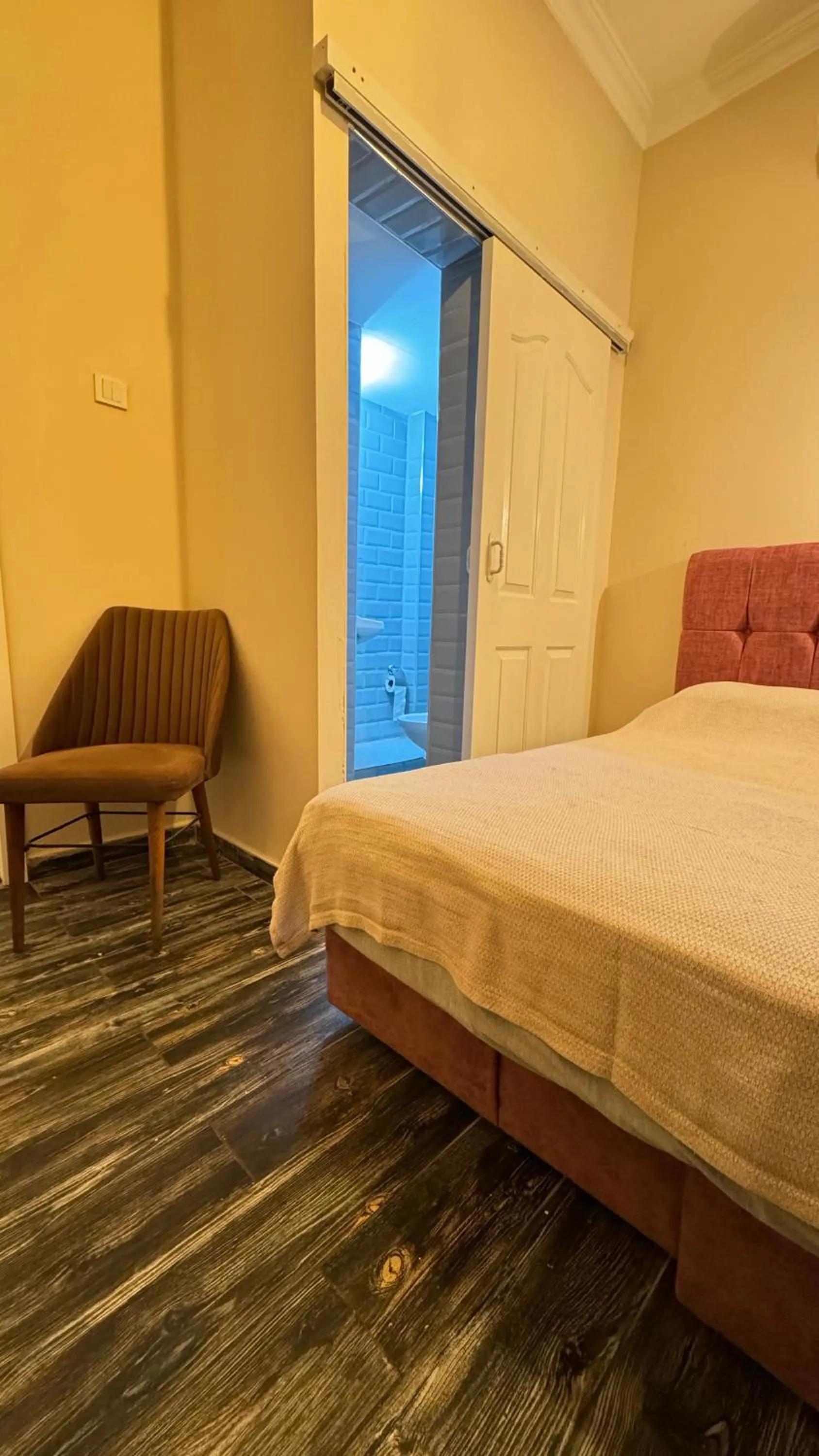 Bed in Callisto Pub & Kitchen & Hotel