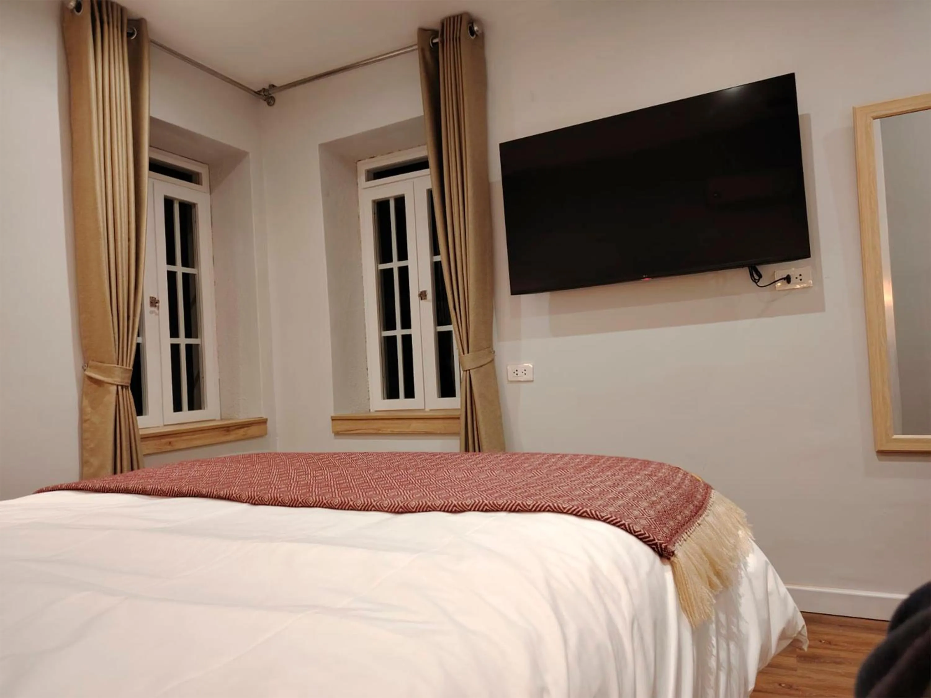 Bed in Casa Cruz Verde by Peru Garden Hotels