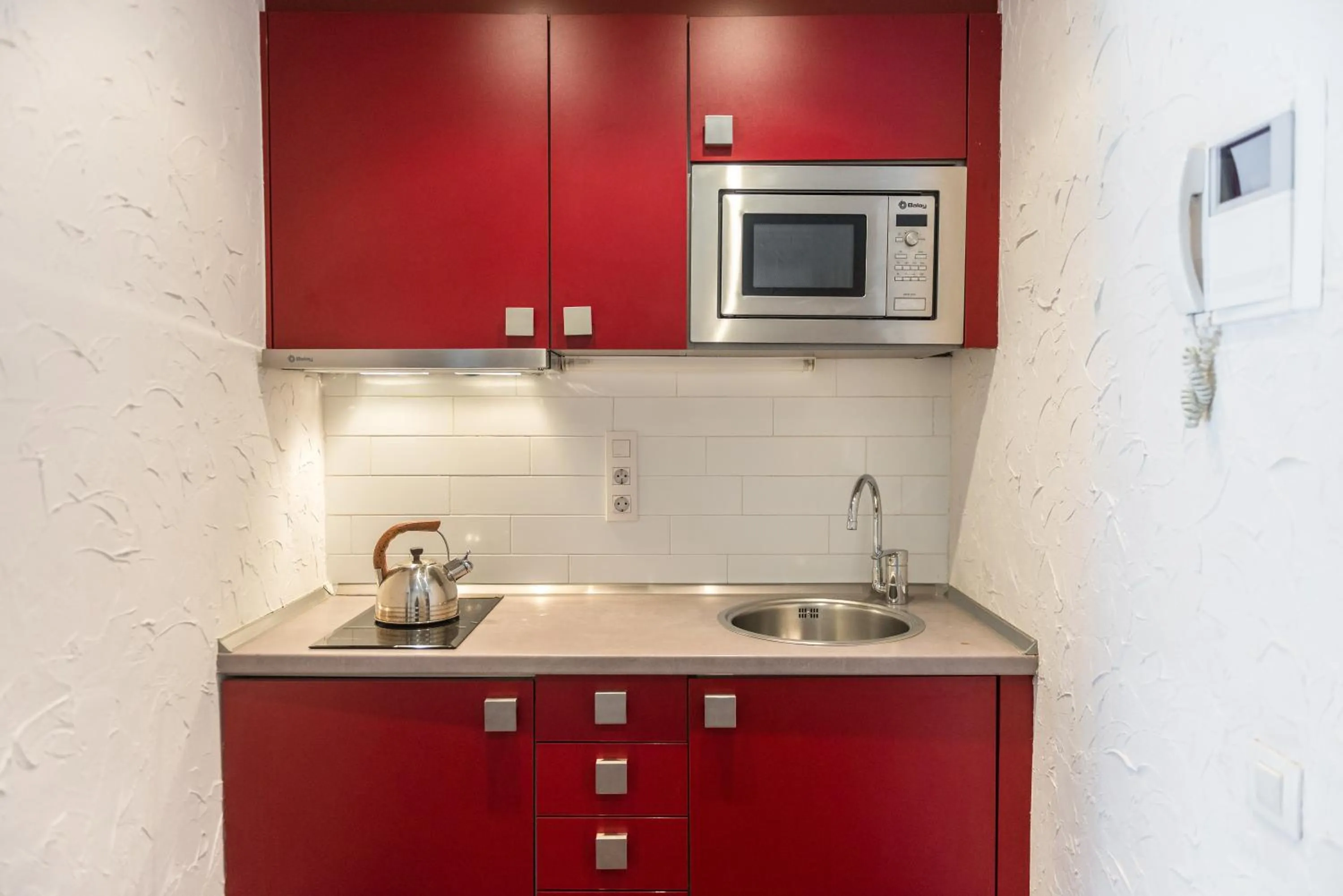 Kitchen or kitchenette in Apartaments Ciutat Vella