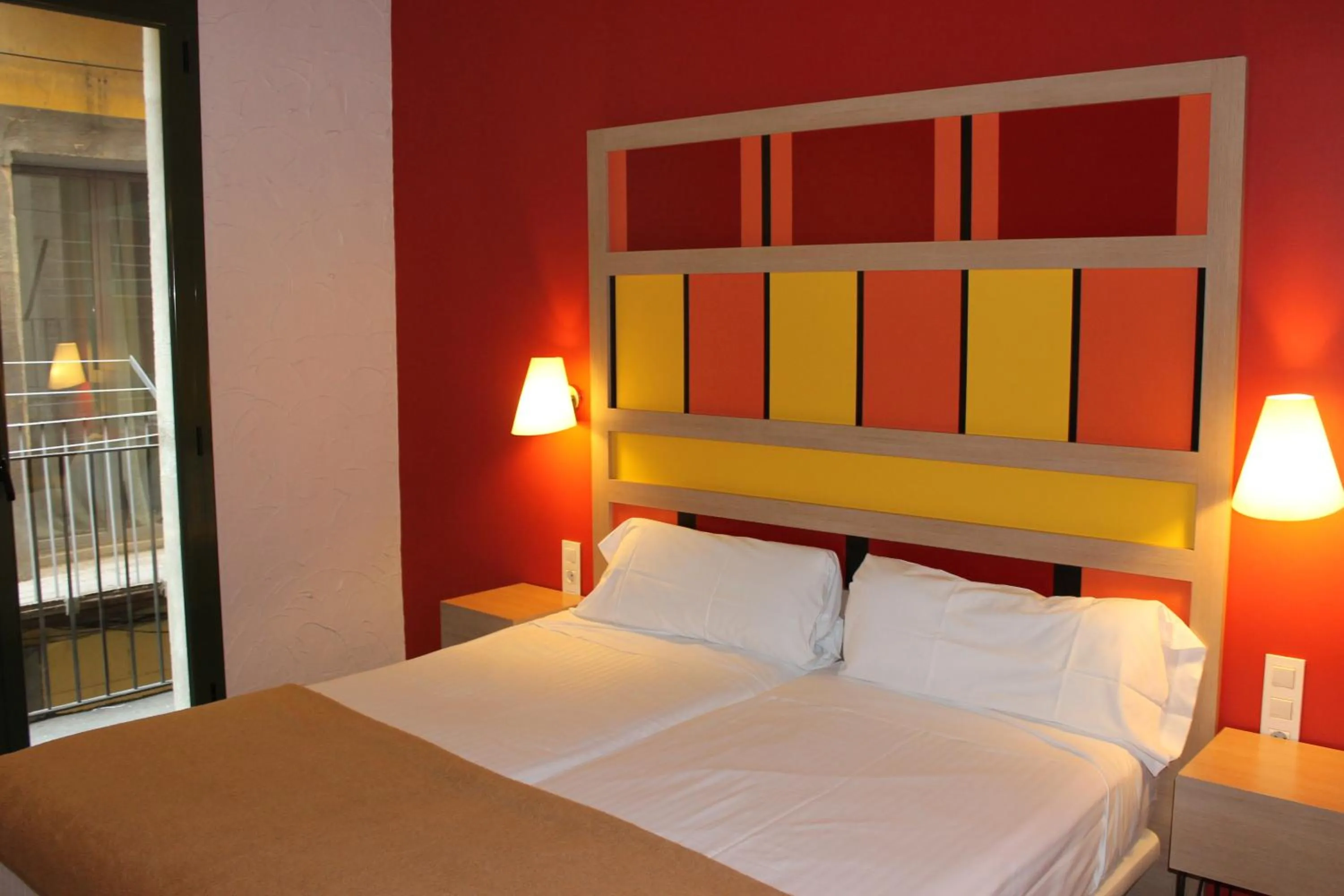 Bedroom, Bed in Apartaments Ciutat Vella