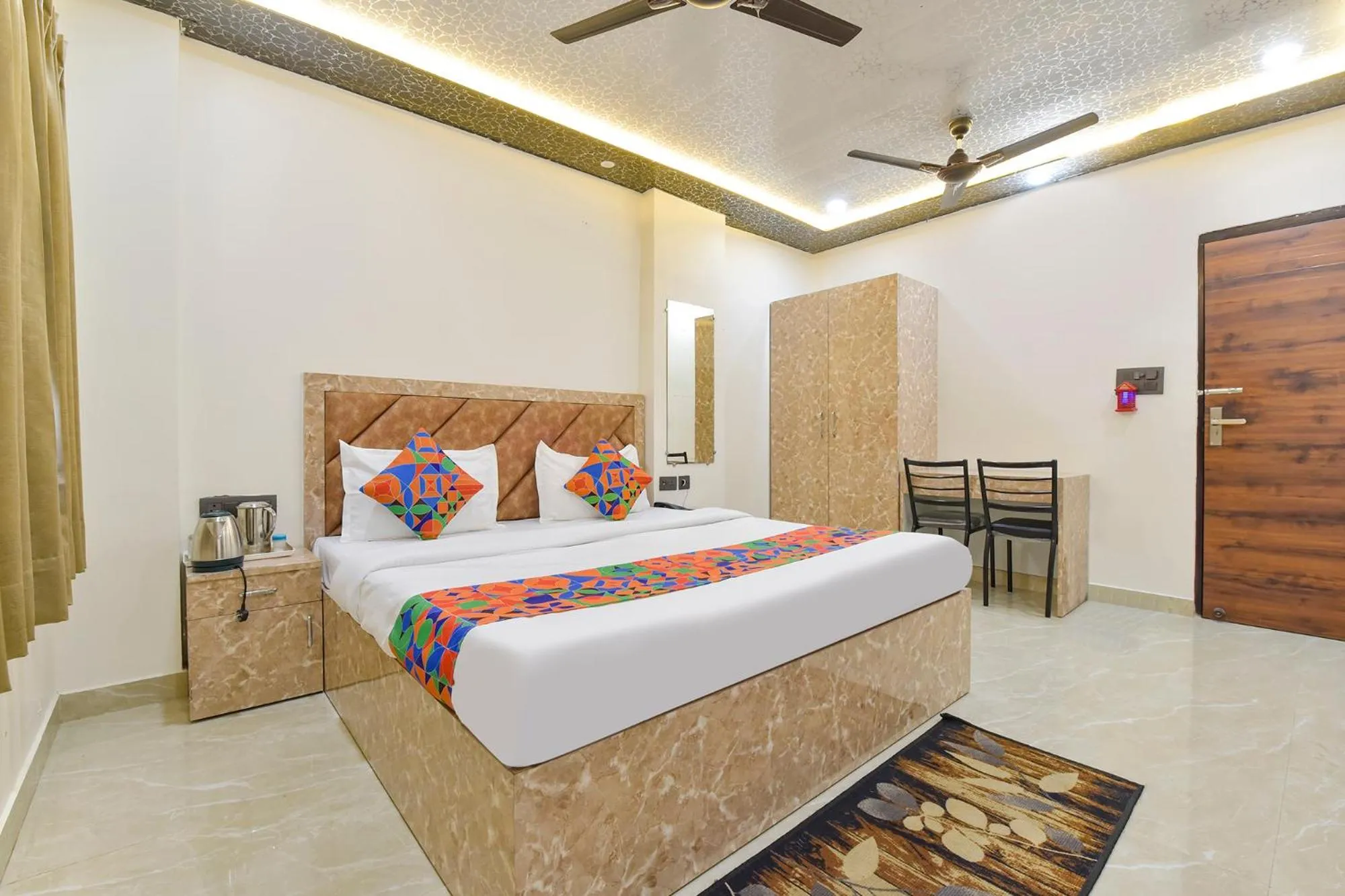 Bed in FabHotel Govindam Royal Stay