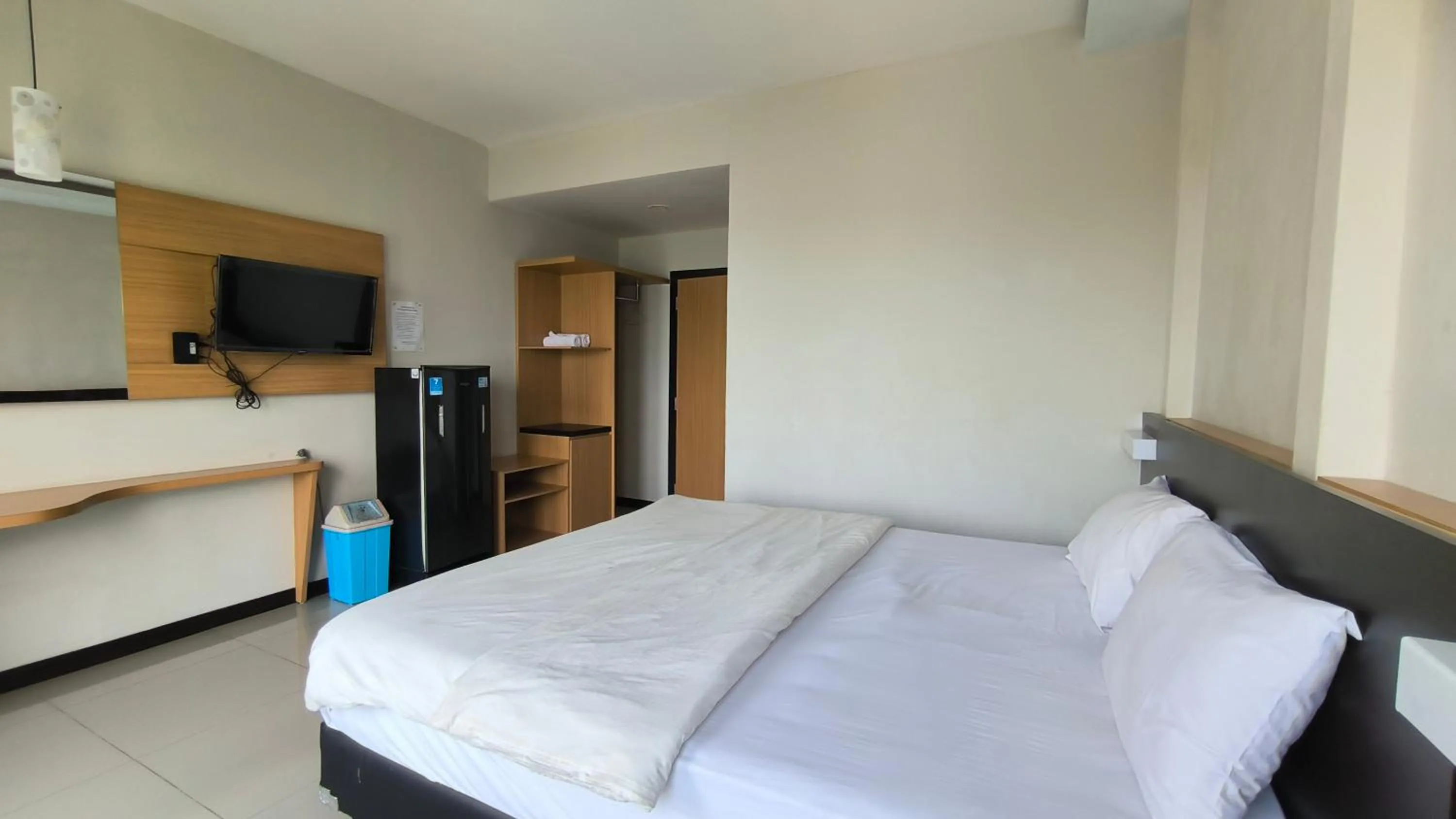 Bed in New Bandengan Beach Hotel