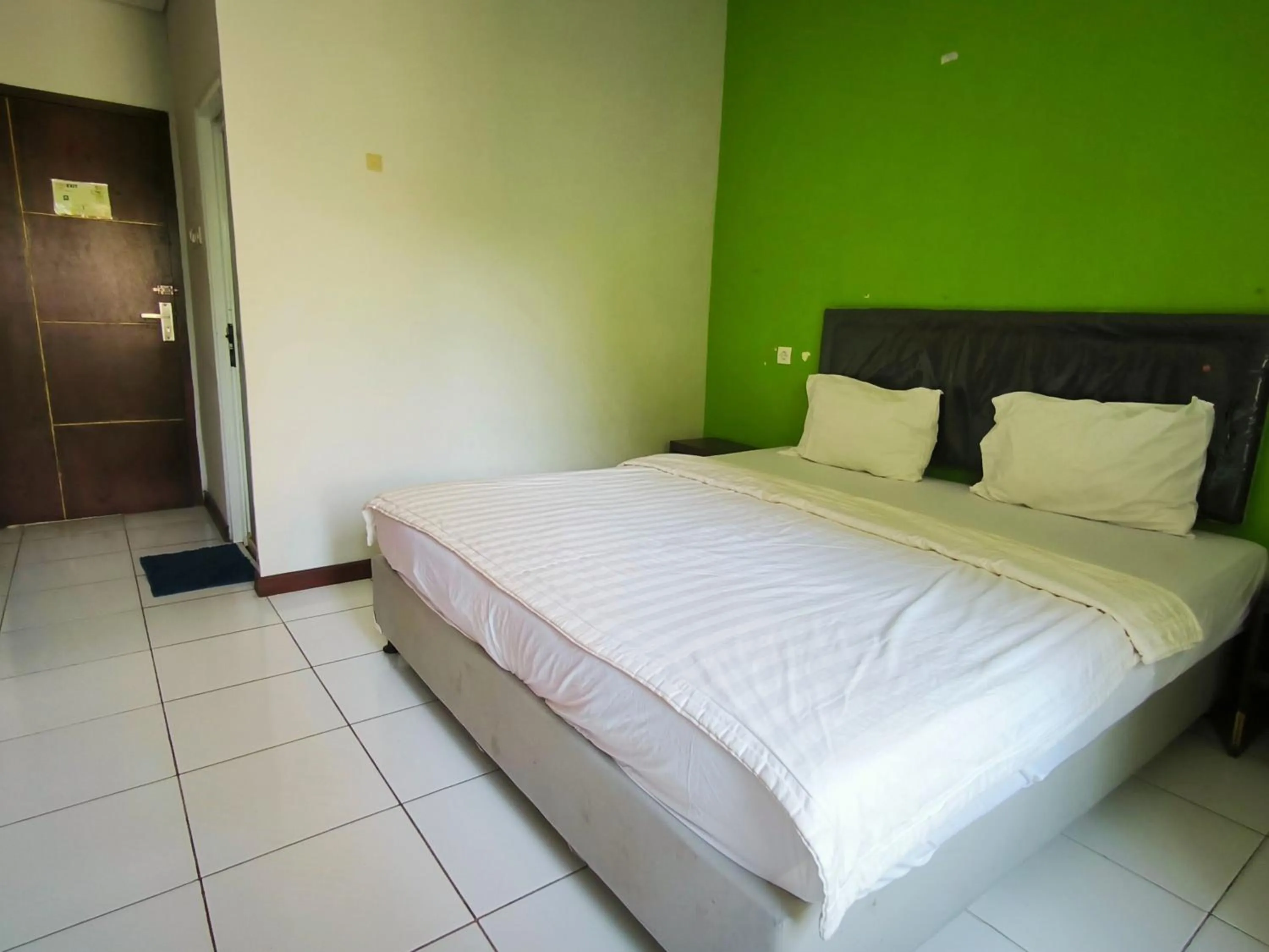 Bed in New Bandengan Beach Hotel