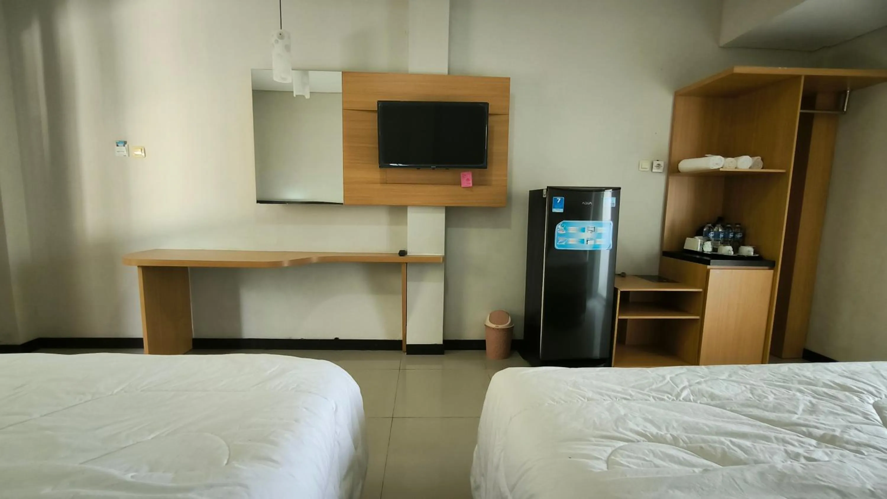 Bed in New Bandengan Beach Hotel