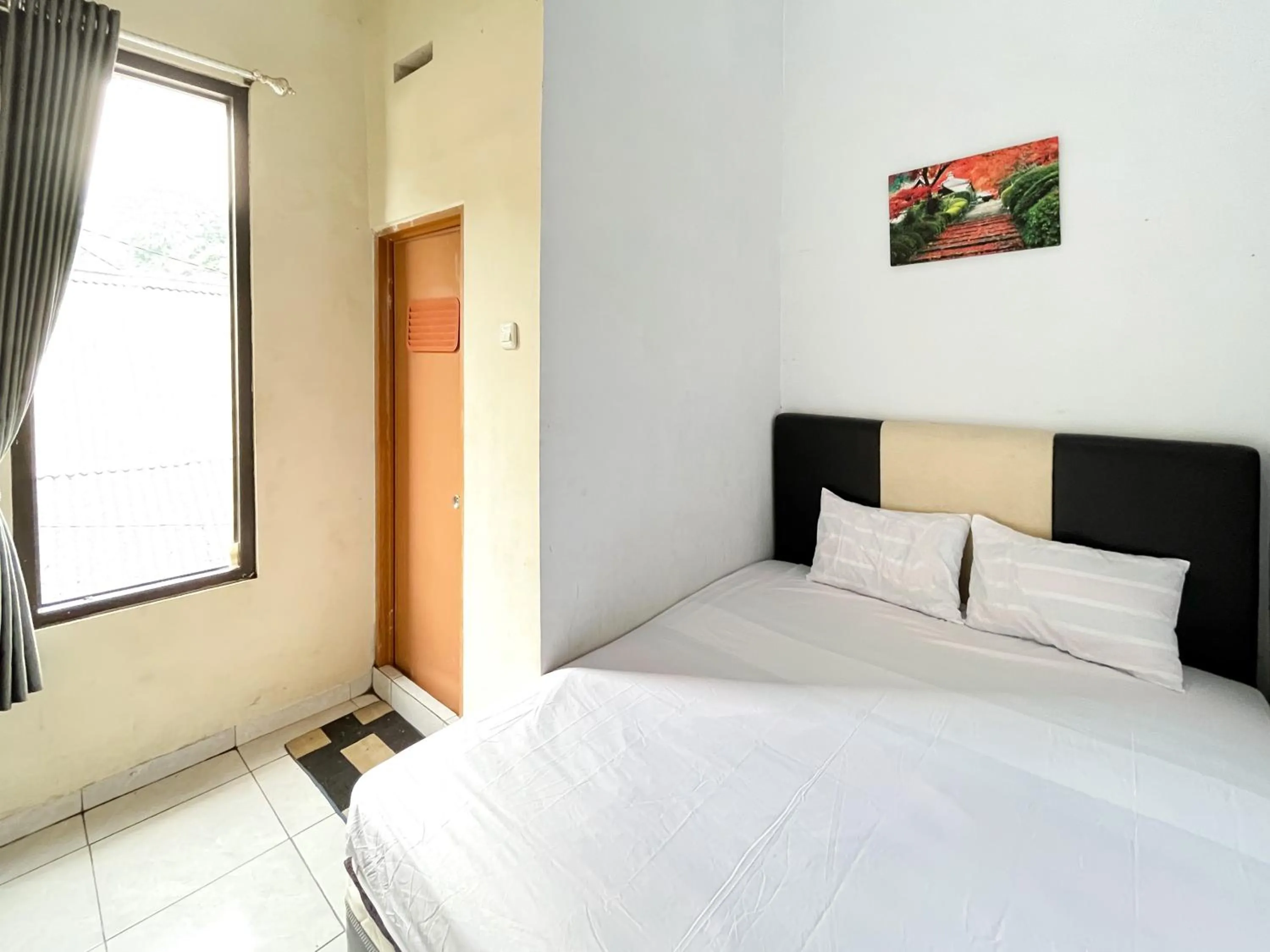 Bedroom in Rumah Bromo RedPartner