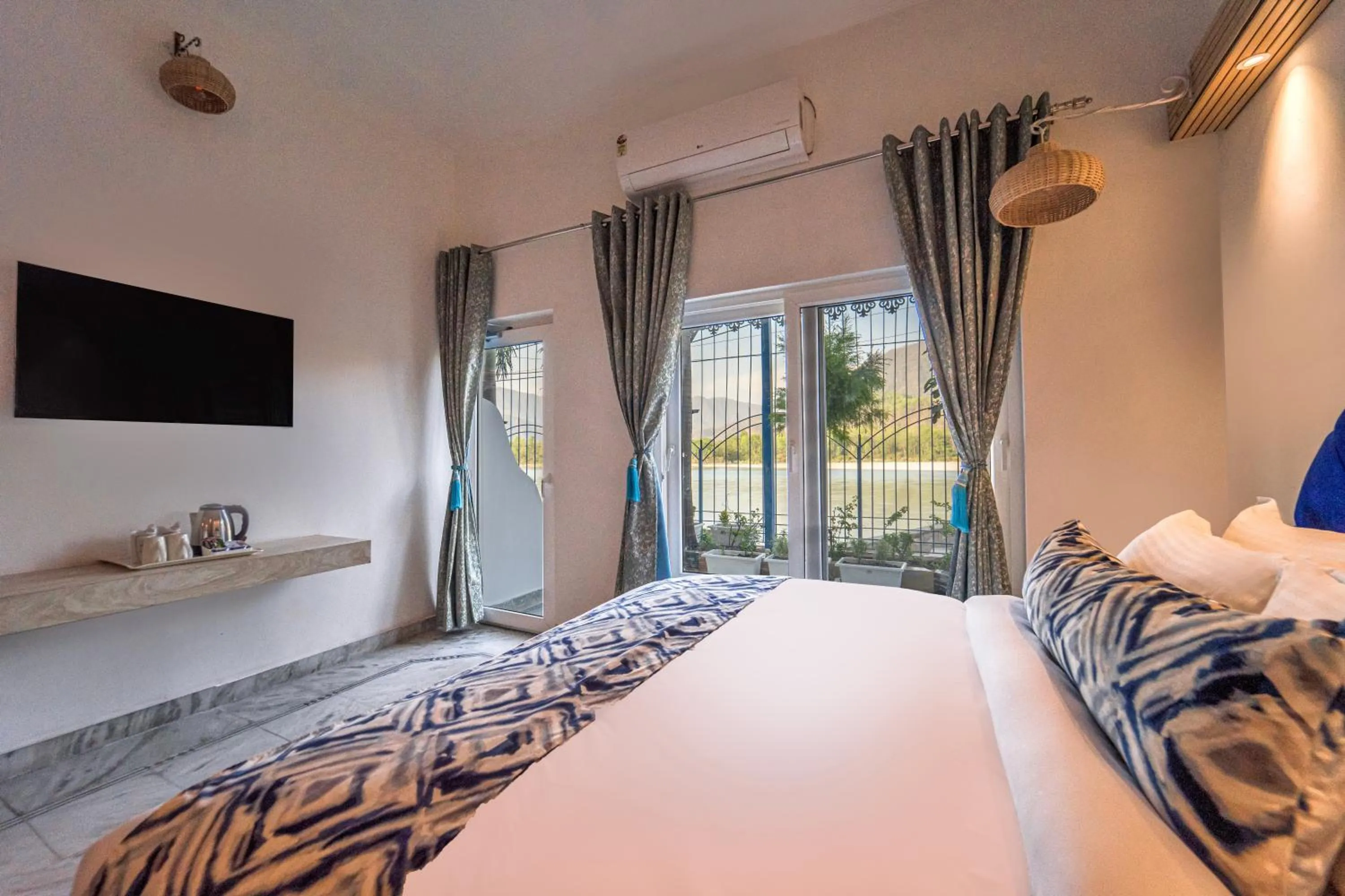 Bed in The Neeraj Ganga Cottages