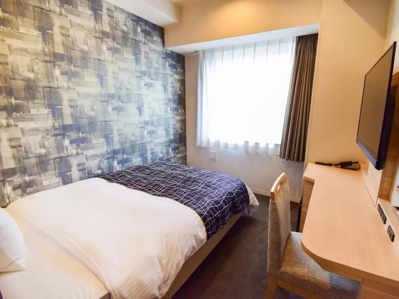 Bed in APA Hotel Kyoto Gojo Omiya Bed in APA Hotel Kyoto Gojo Omiya