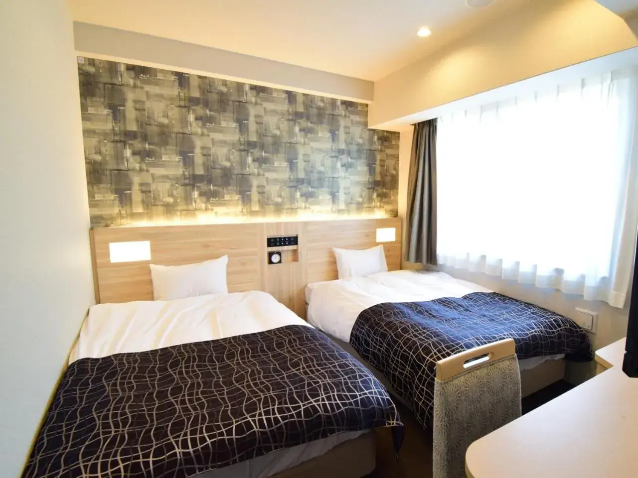 Bed in APA Hotel Kyoto Gojo Omiya Bed in APA Hotel Kyoto Gojo Omiya