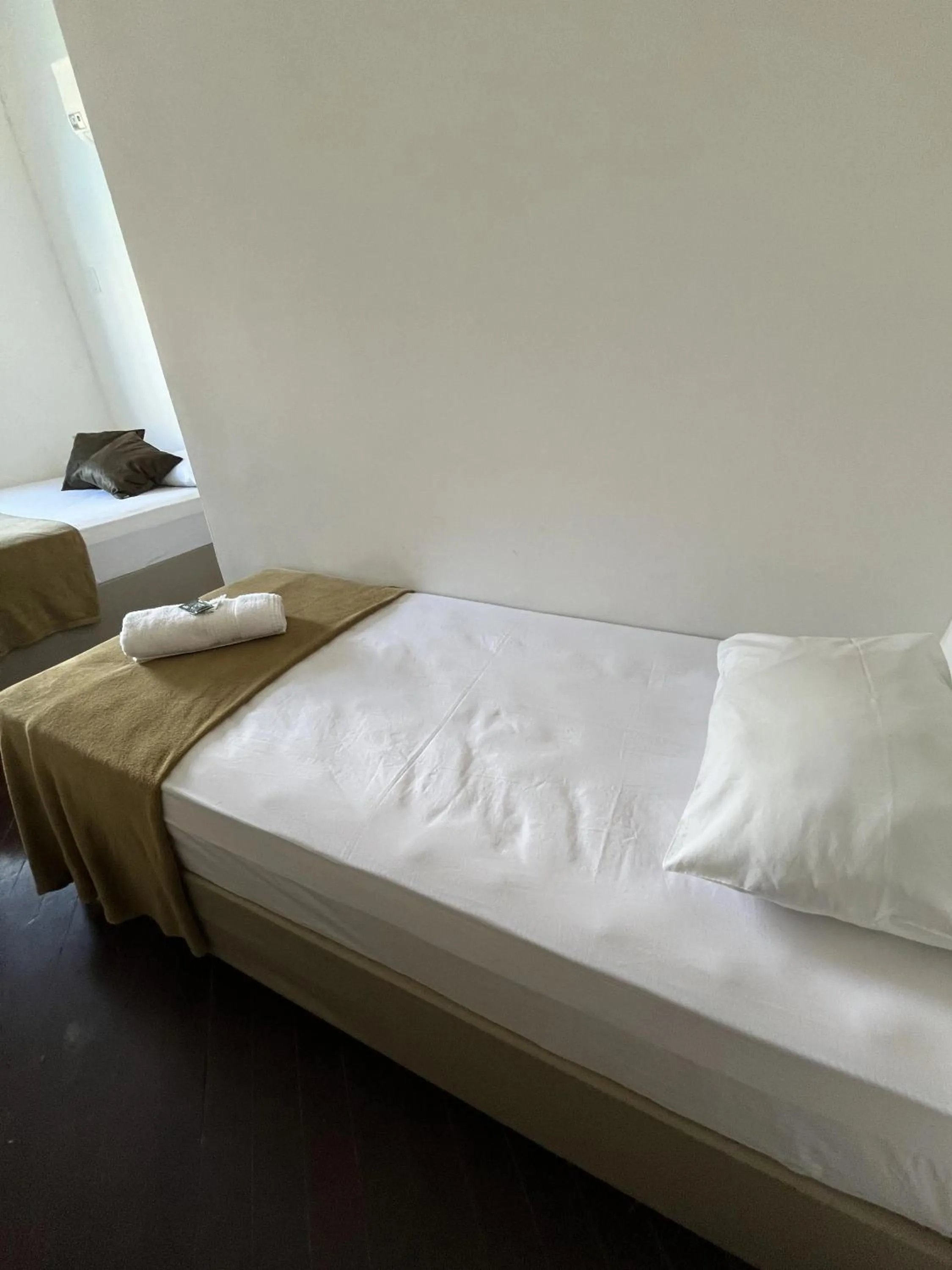Bed in Pousada Aloha Santos