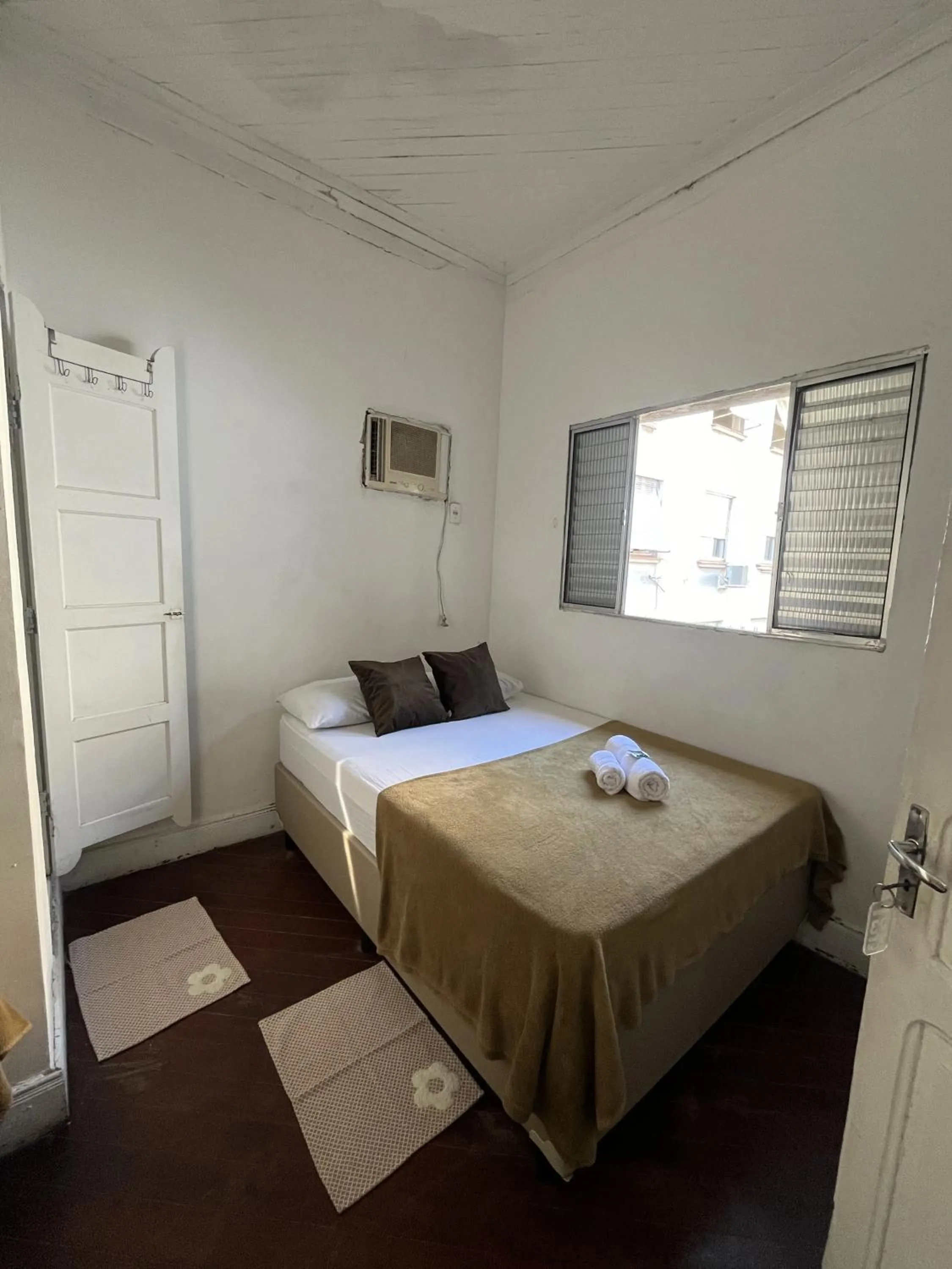 Bed in Pousada Aloha Santos
