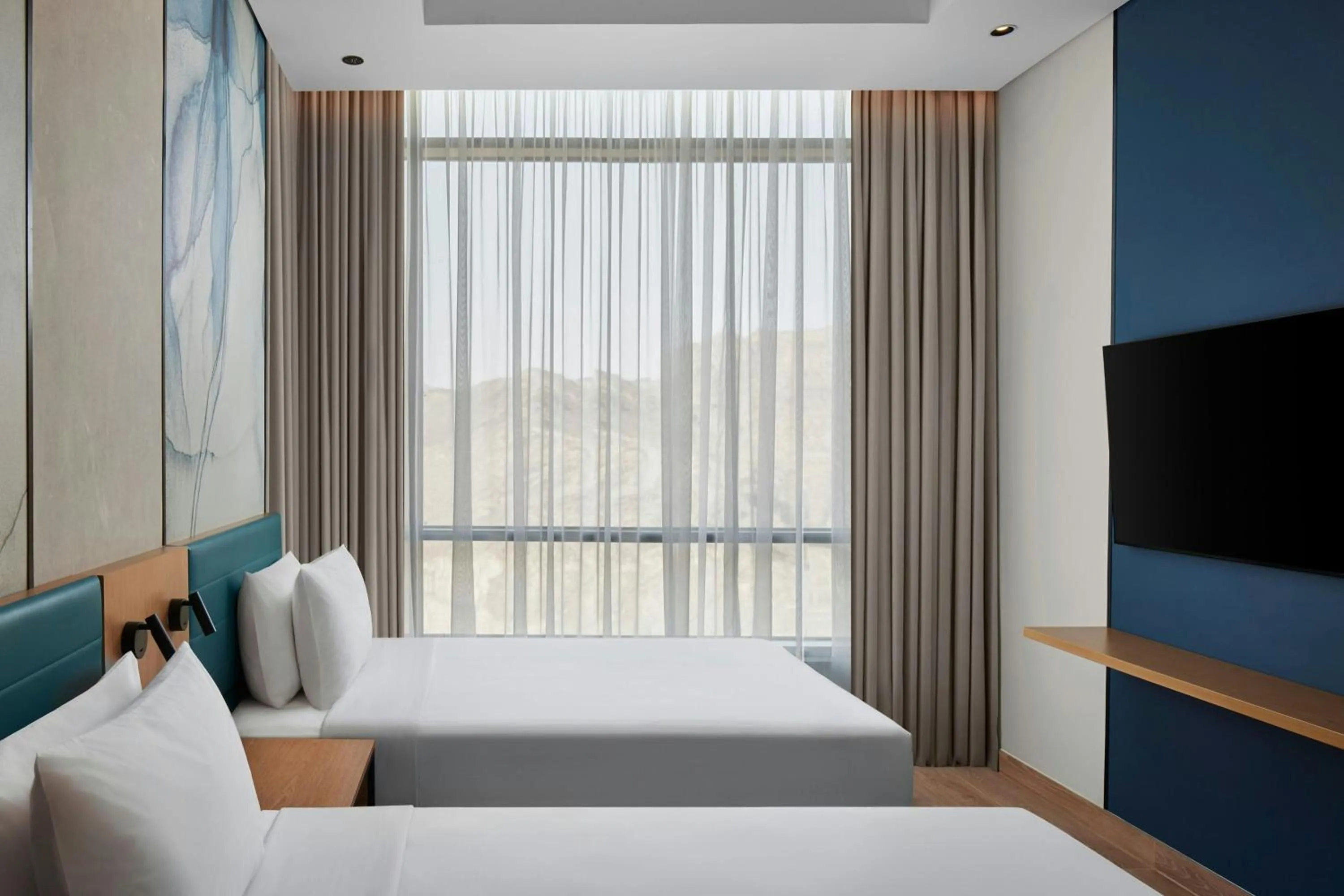 Photo of the whole room, Bed in Courtyard by Marriott Makkah