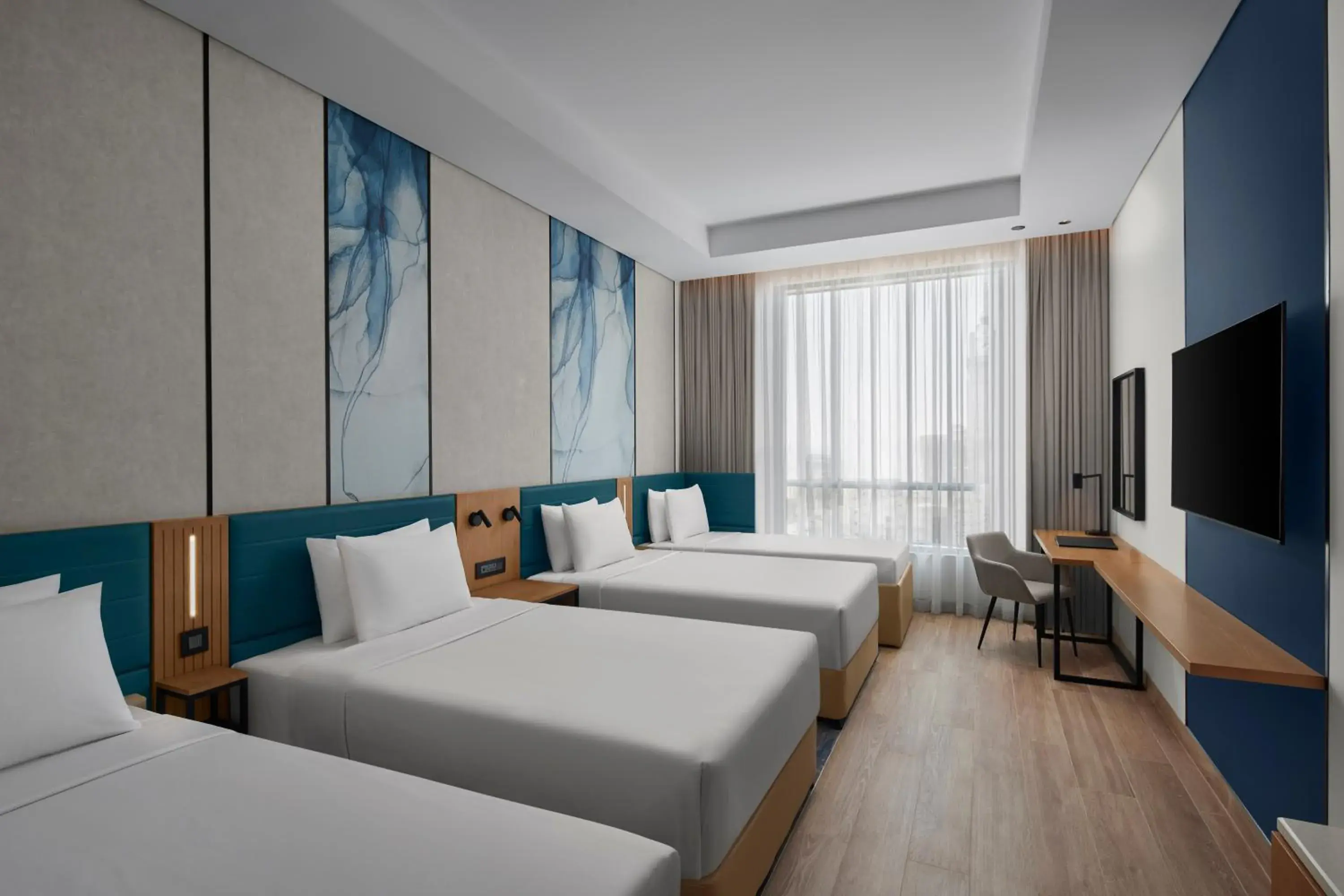 Premium Quadruple Room with Four Twin Beds in Courtyard by Marriott Makkah Premium Quadruple Room with Four Twin Beds in Courtyard by Marriott Makkah