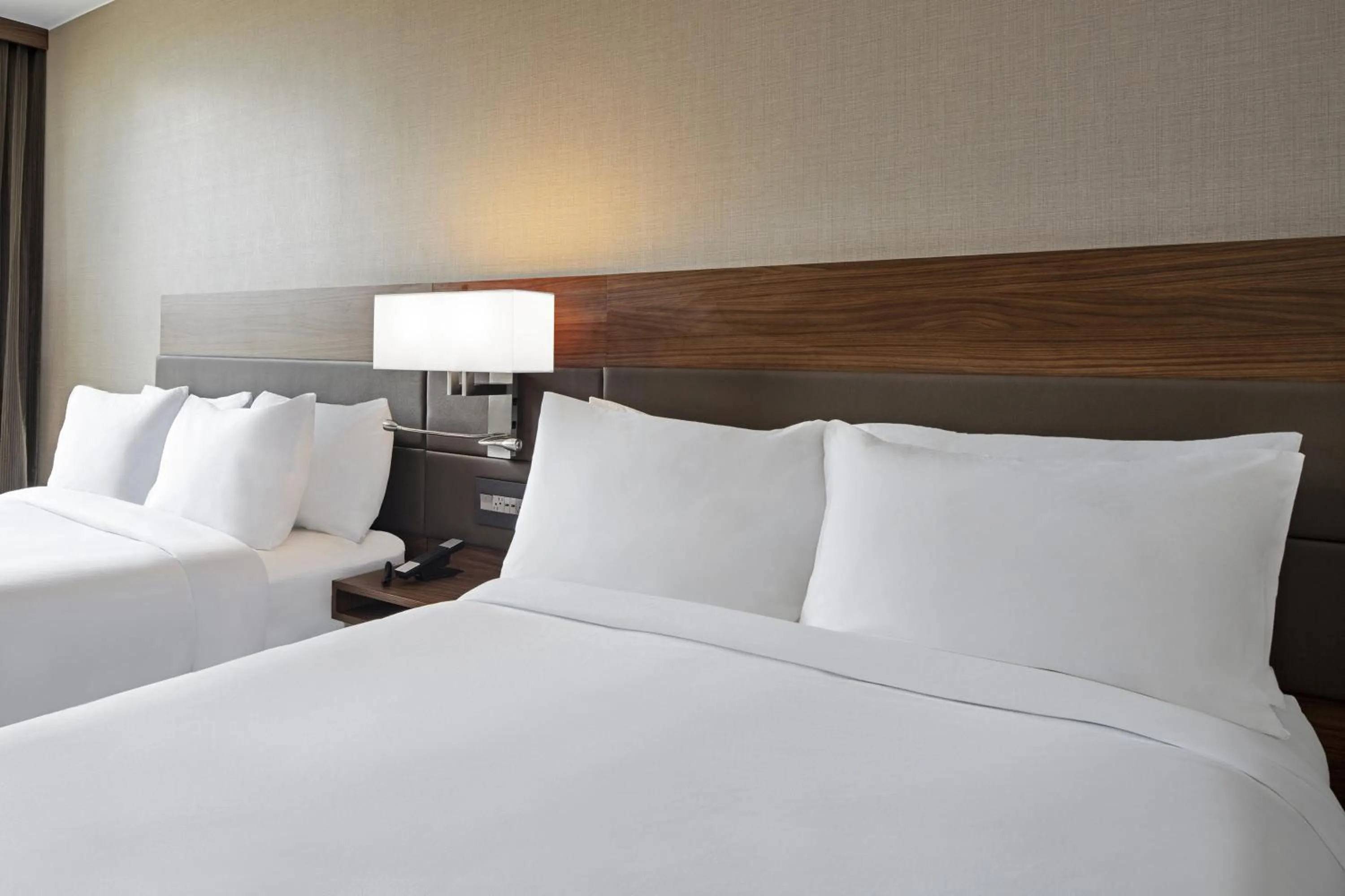Bed in AC Hotel by Marriott St. Louis Clayton