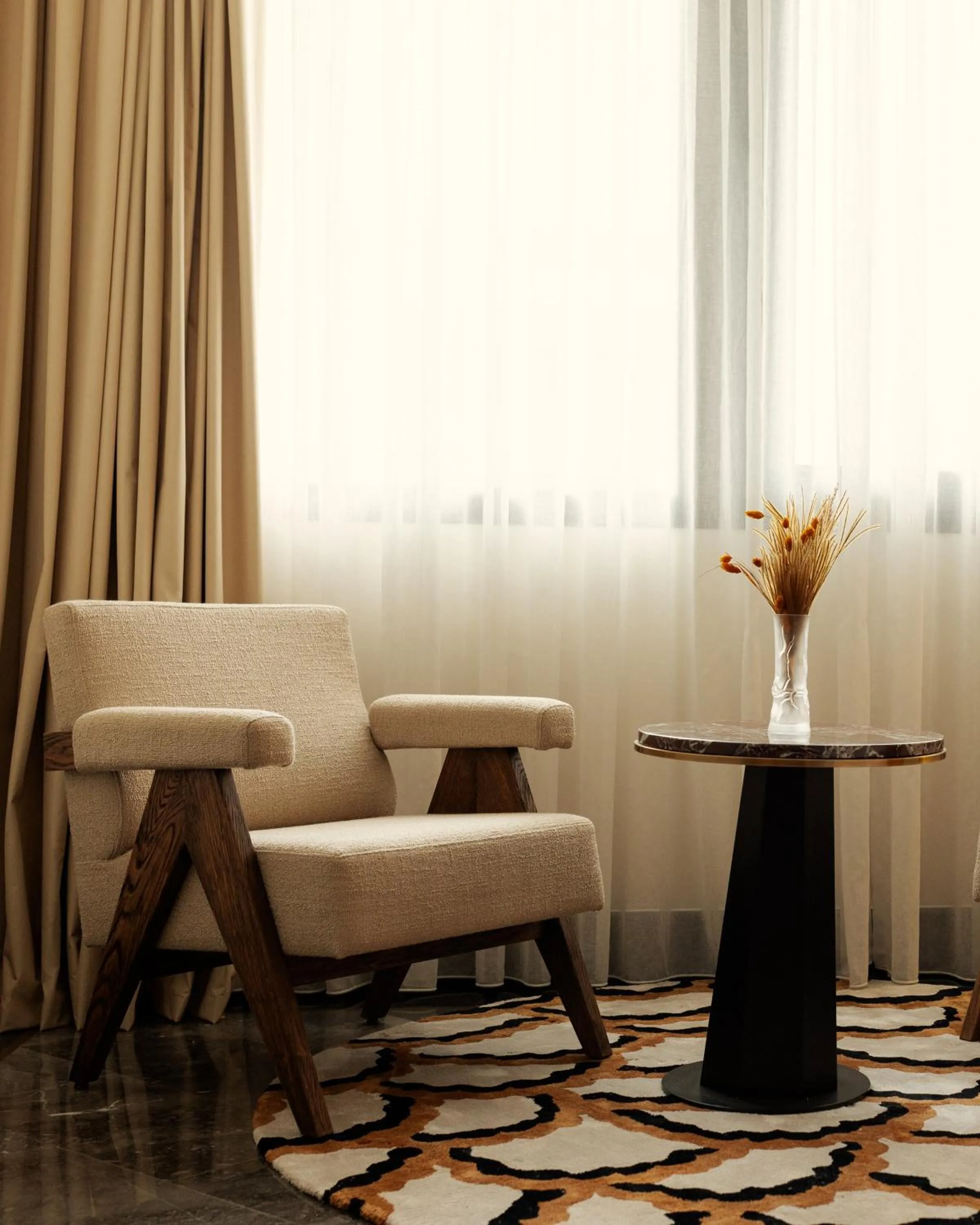 Seating area in Marly Boutique Hôtel