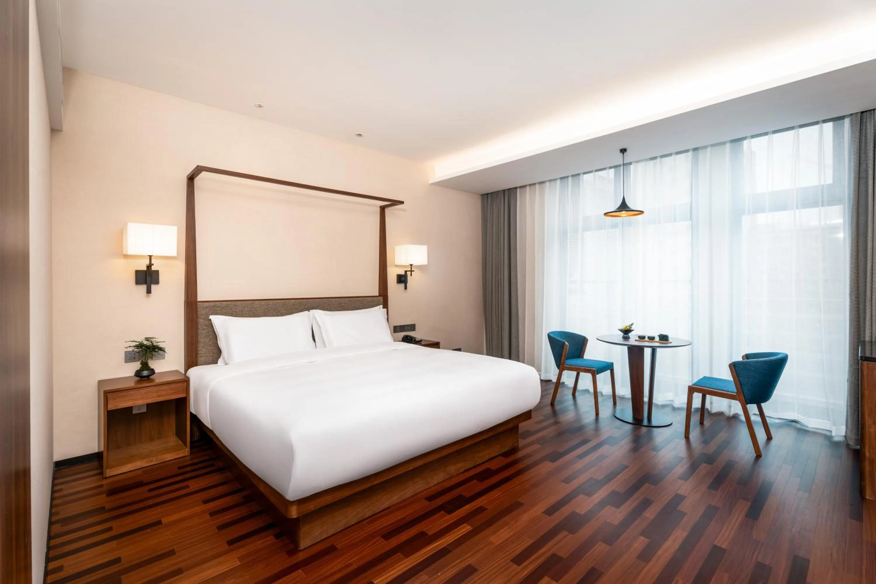 Photo of the whole room, Bed in SSAW Boutique Hotel Foshan Qiandeng Lake