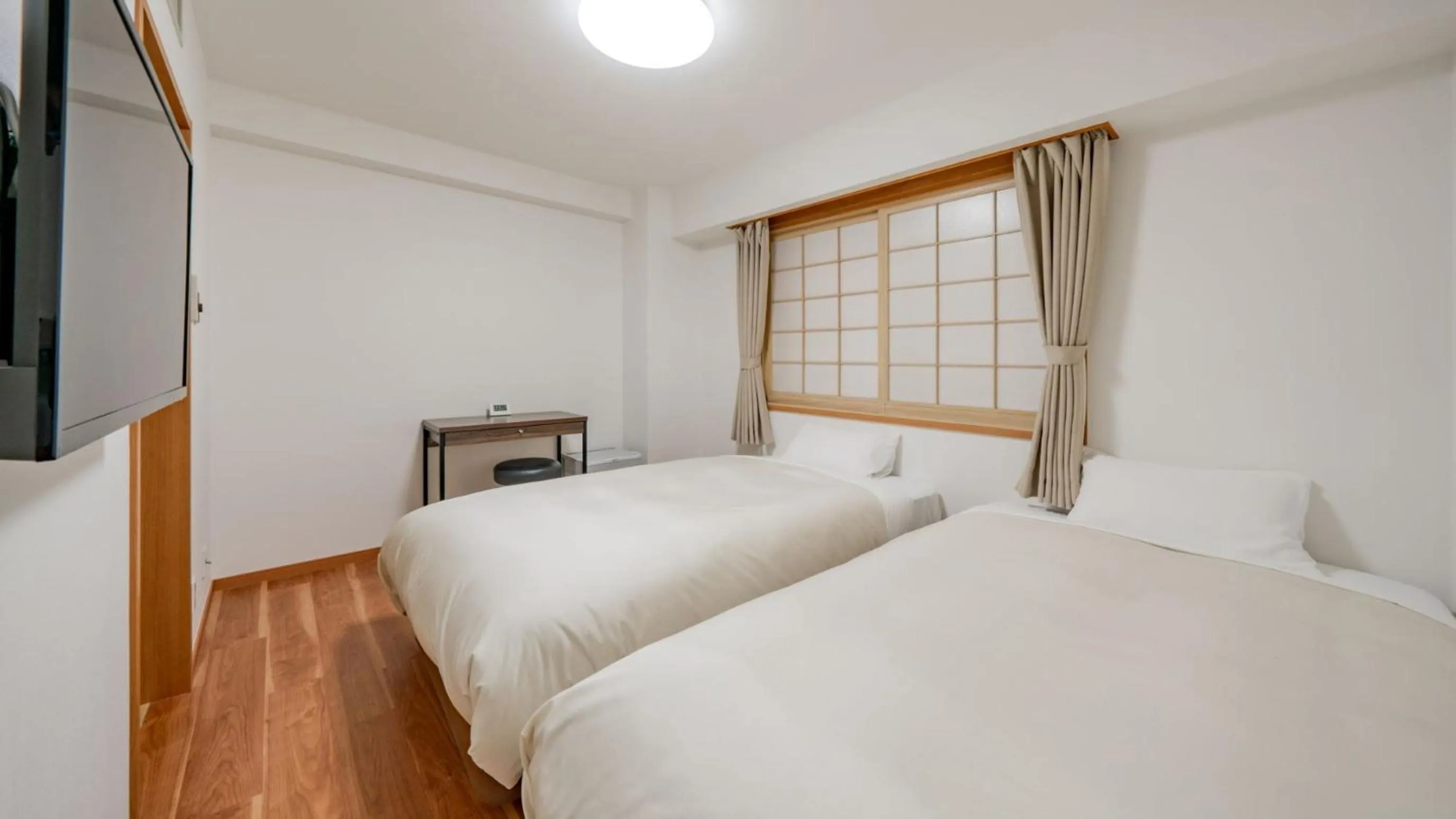 Photo of the whole room, Bed in Hotel Obihiro Hills