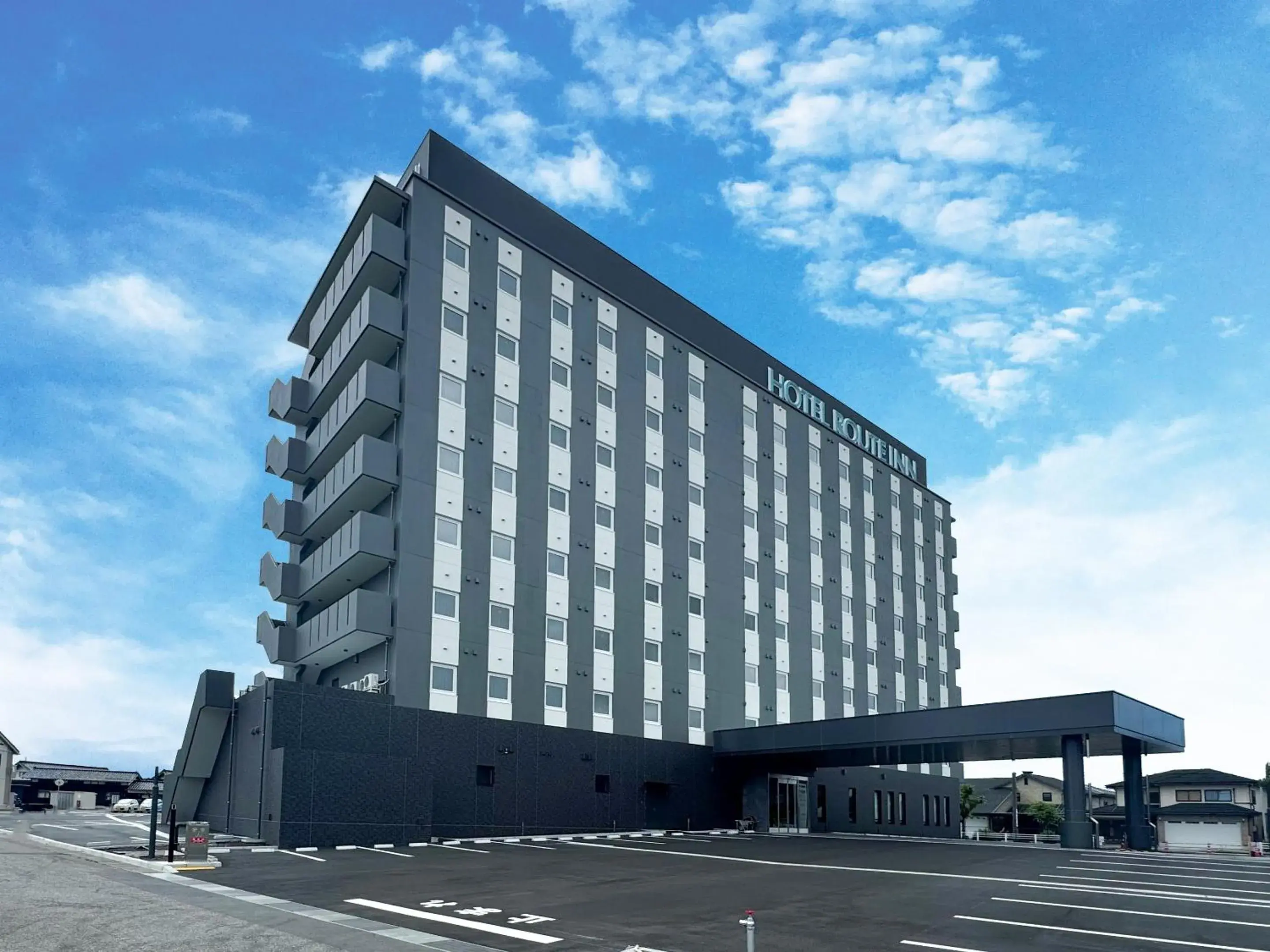 Property building in Hotel Route Inn Tonami Inter Property building in Hotel Route Inn Tonami Inter