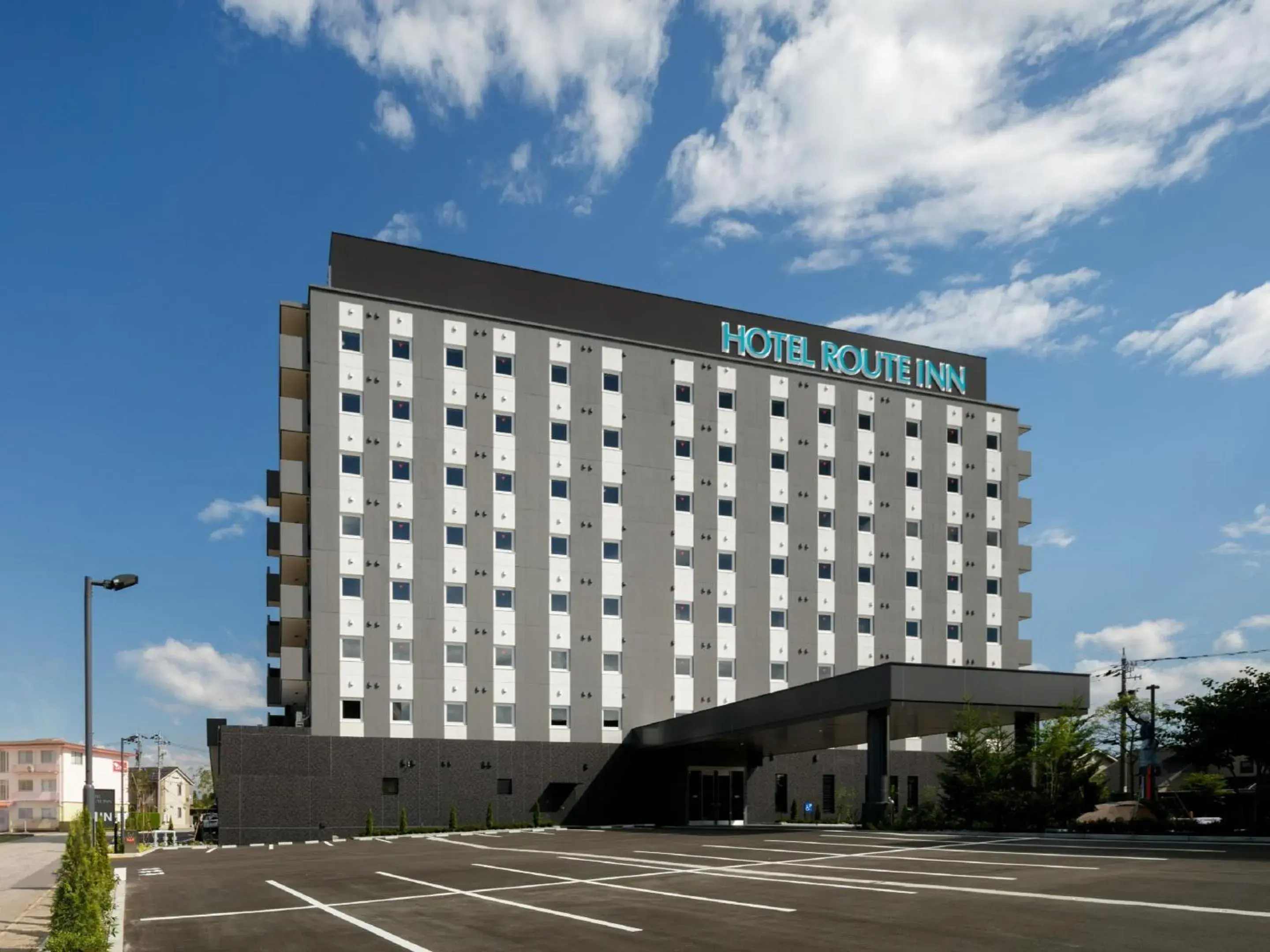 Property building in Hotel Route Inn Tonami Inter Property building in Hotel Route Inn Tonami Inter