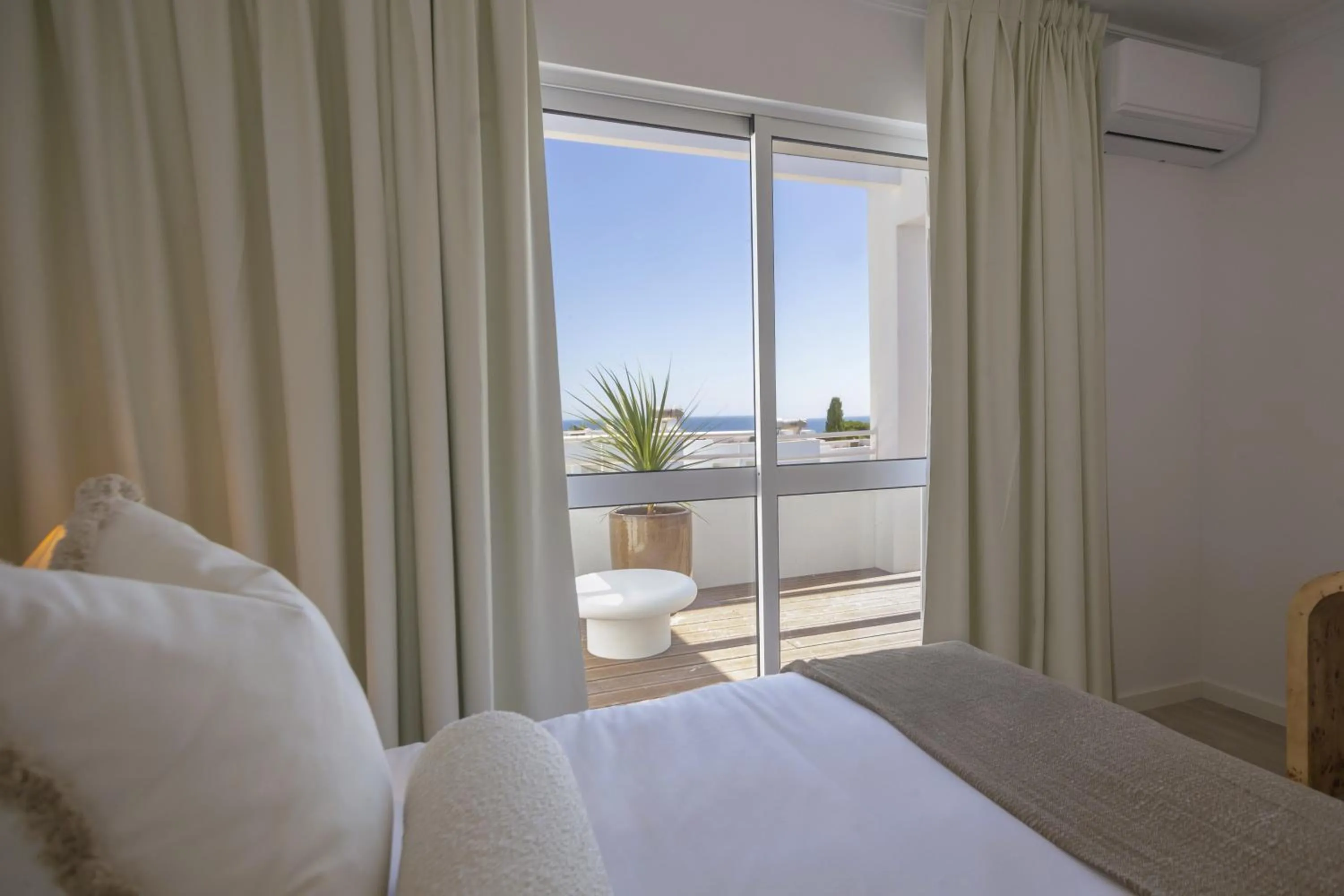 Bedroom in Villas d'Água Beachfront Resort