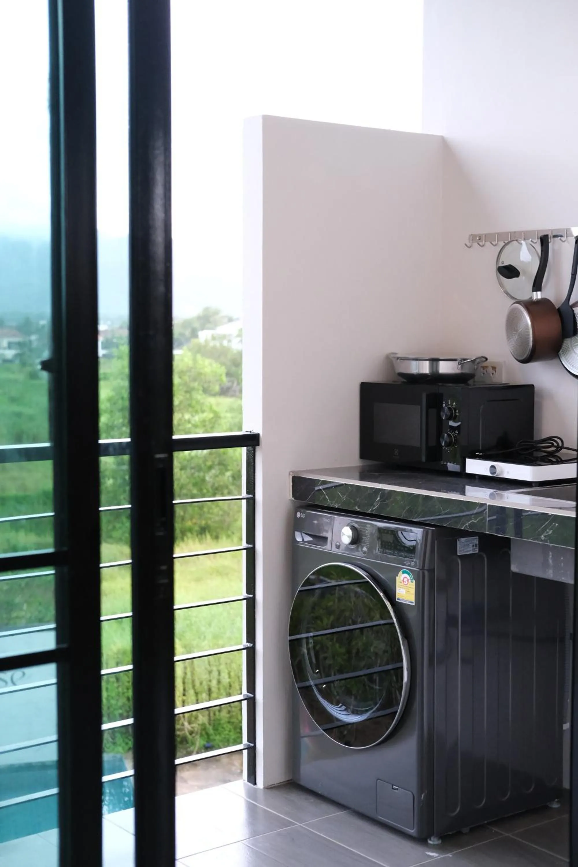 Kitchen or kitchenette in Alisse Stay Phuket Layan