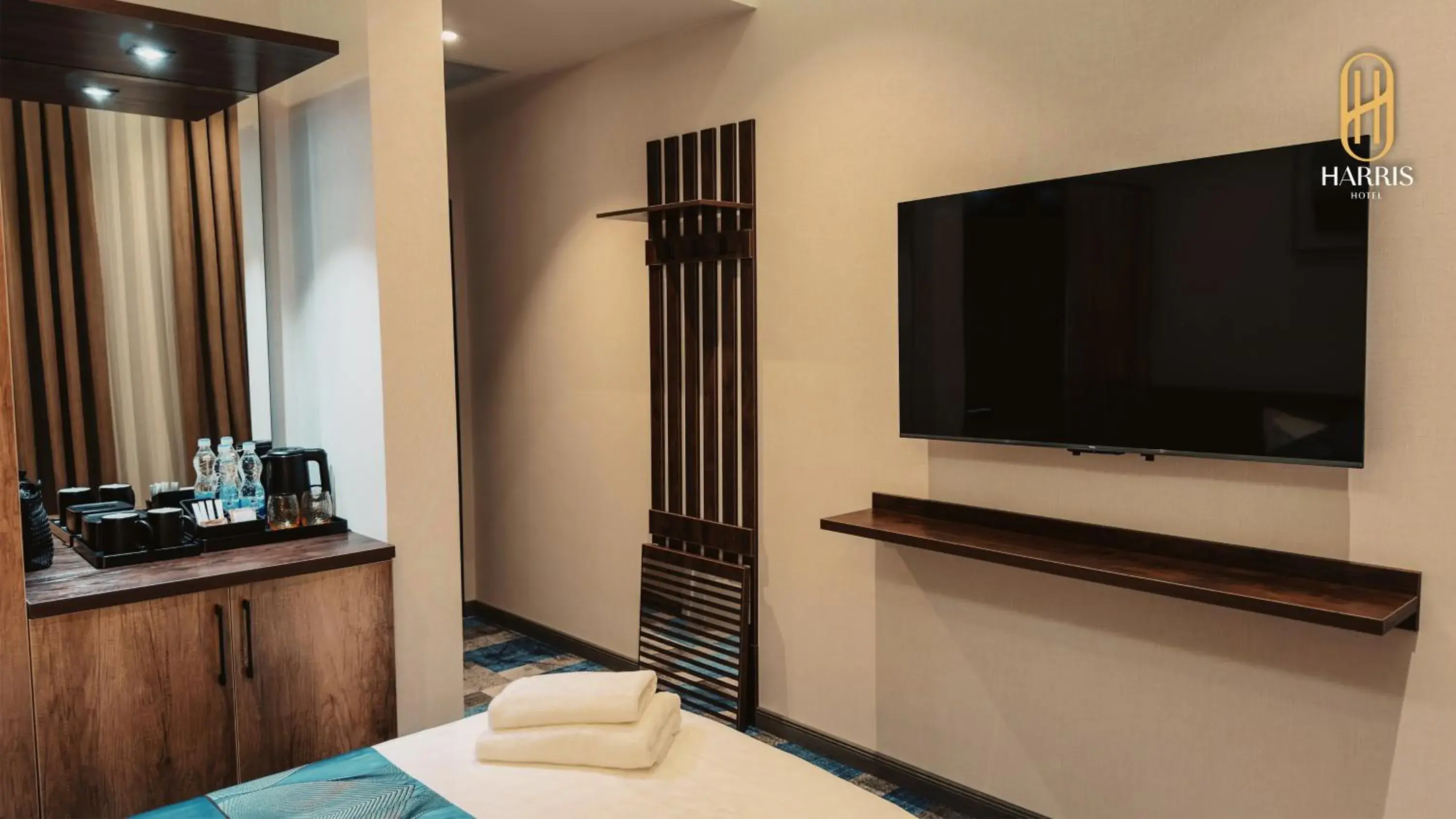 TV and multimedia, Bed in Harris Hotel Spa&Fitness TV and multimedia, Bed in Harris Hotel Spa&Fitness