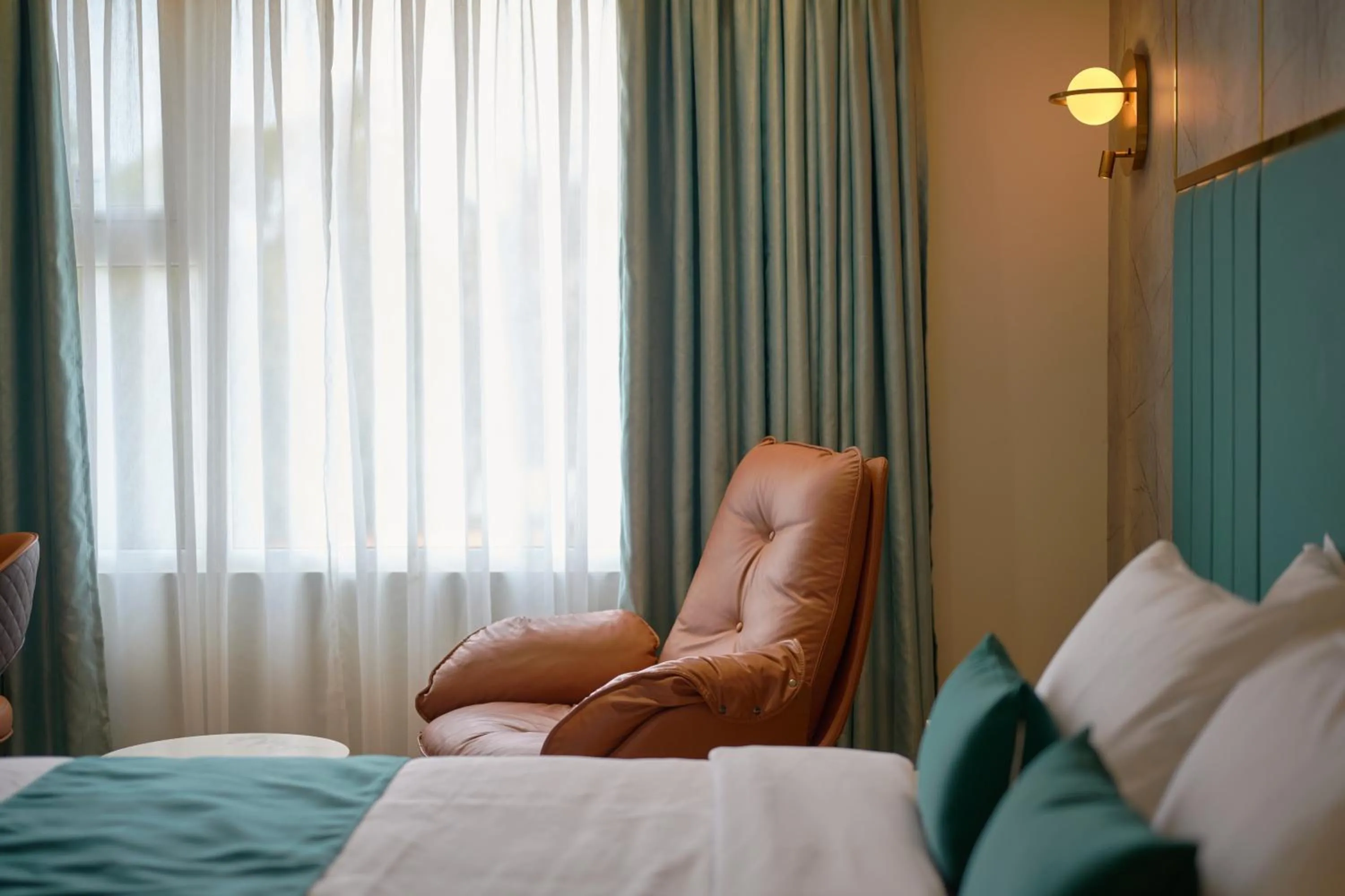 Bed in Kowju Airport Hotel Calicut