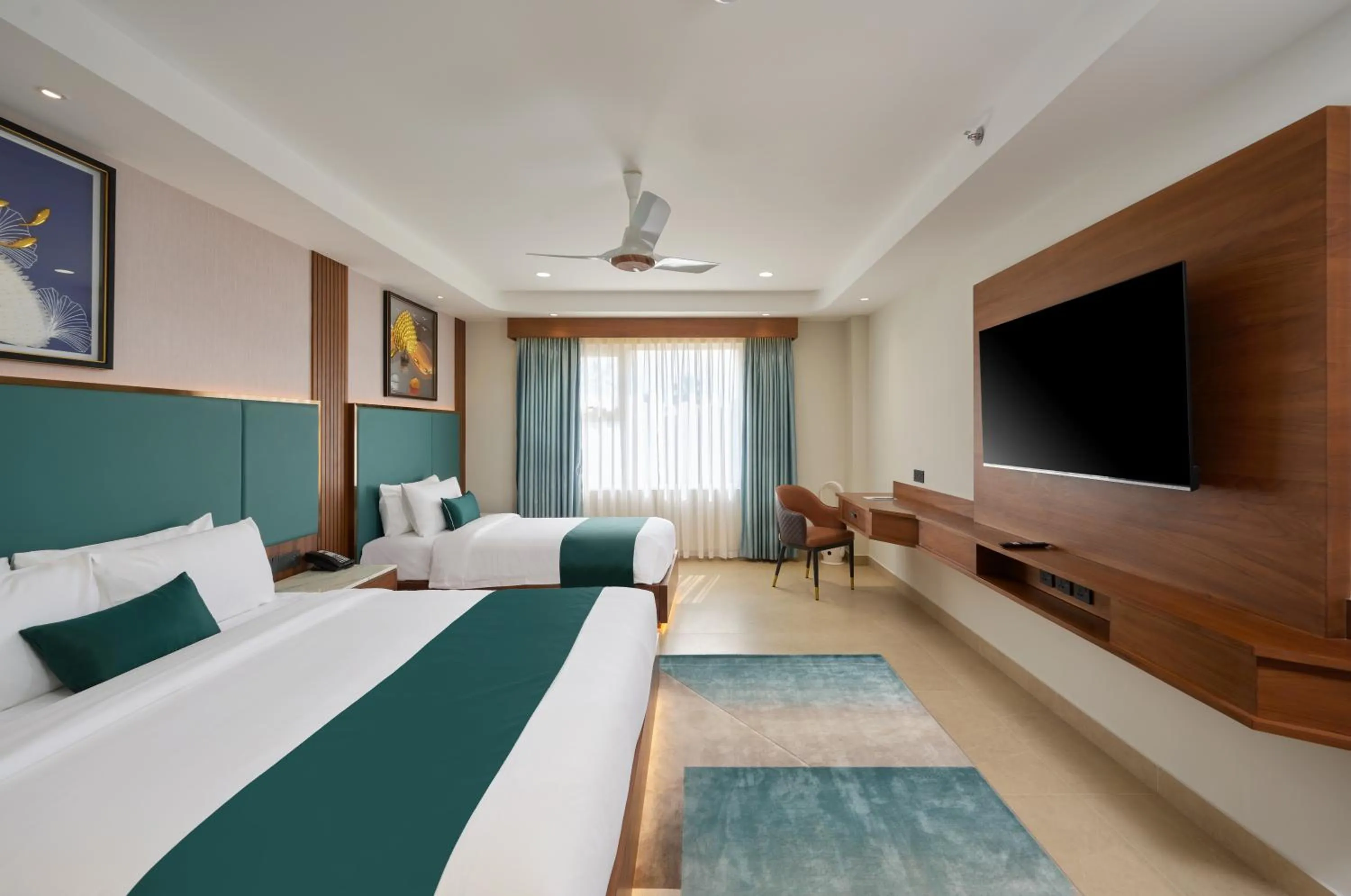 Bed in Kowju Airport Hotel Calicut