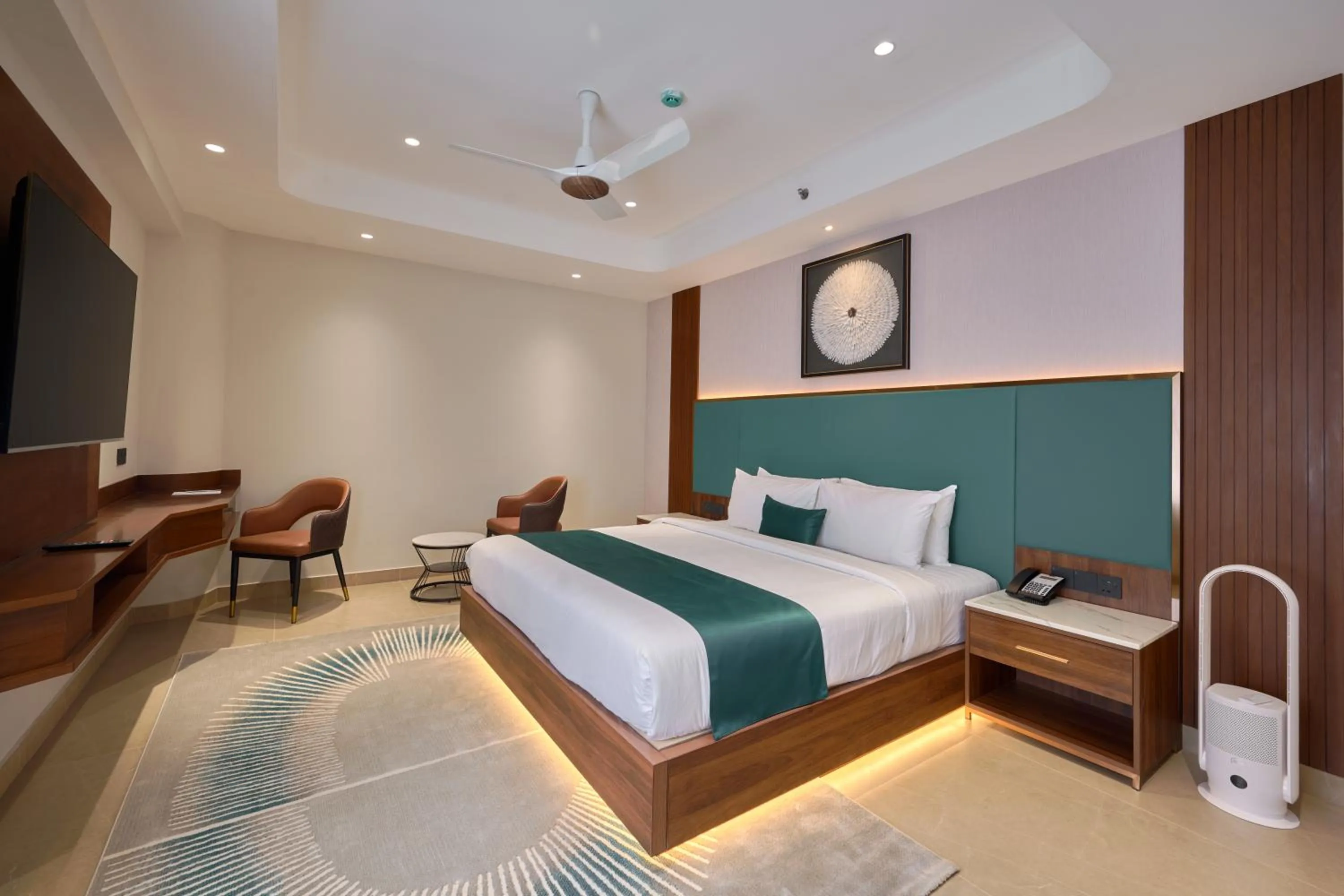 Photo of the whole room, Bed in Kowju Airport Hotel Calicut