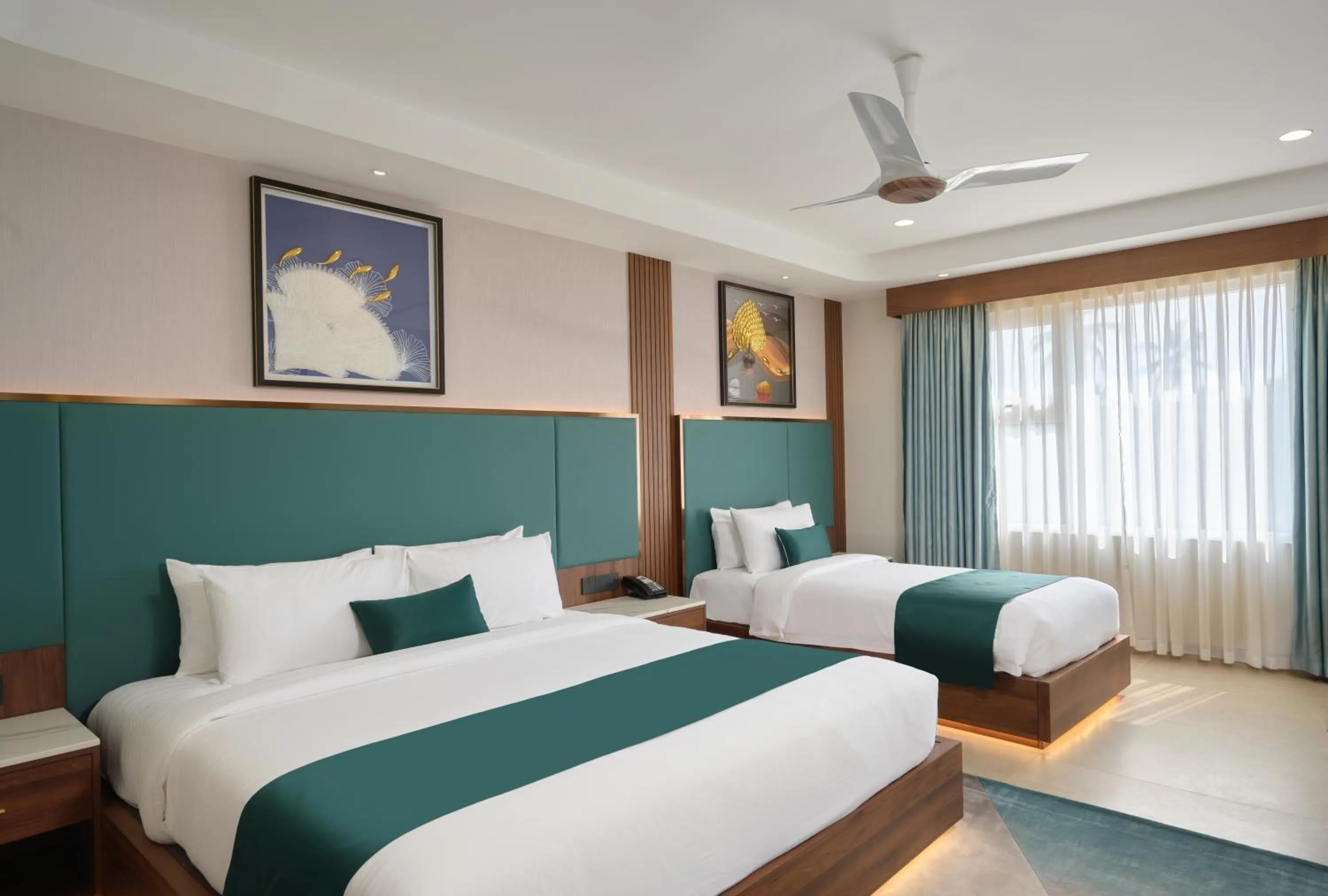 Bed in Kowju Airport Hotel Calicut