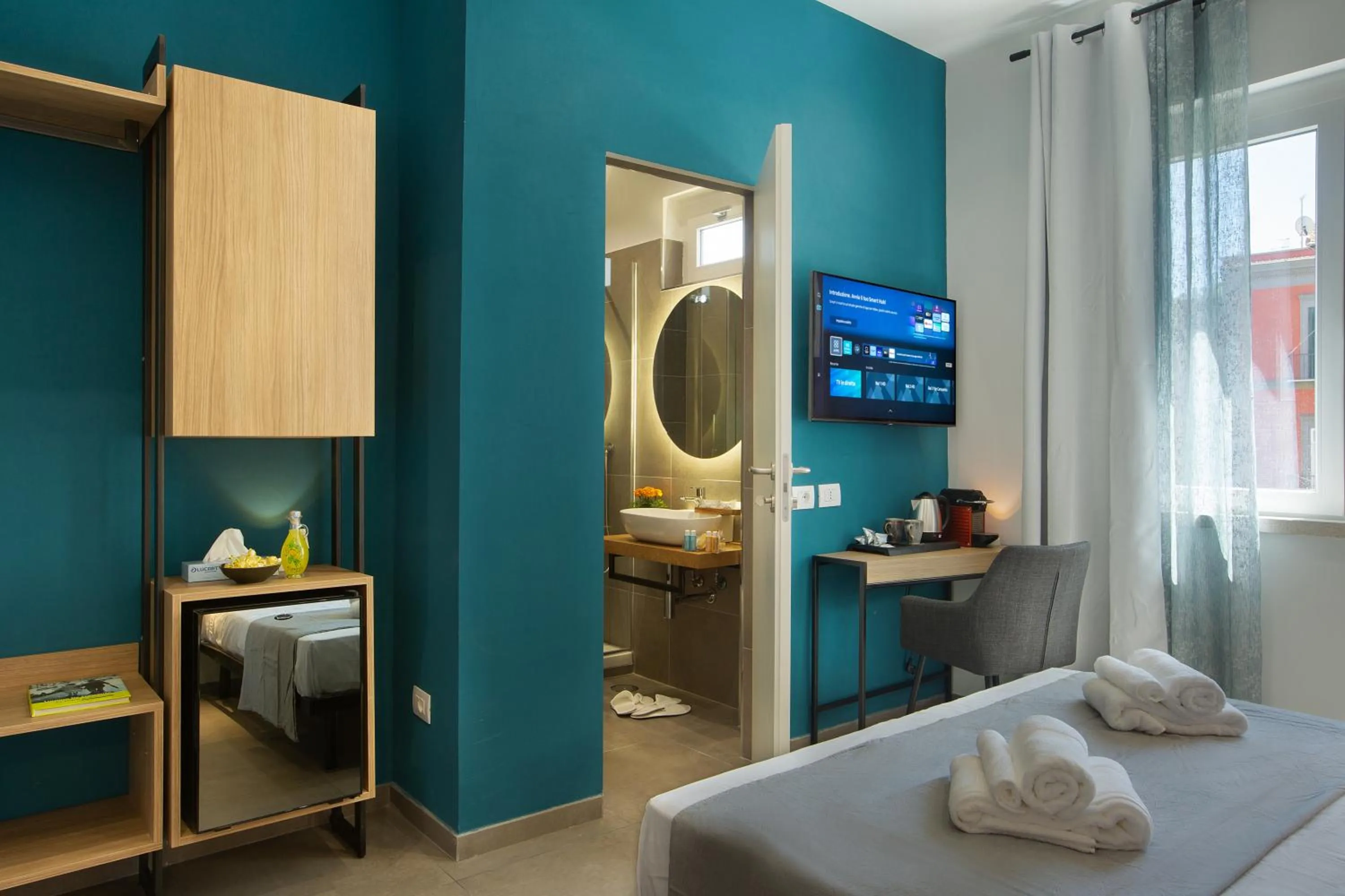 Bed in MARE FUORI ROOMS