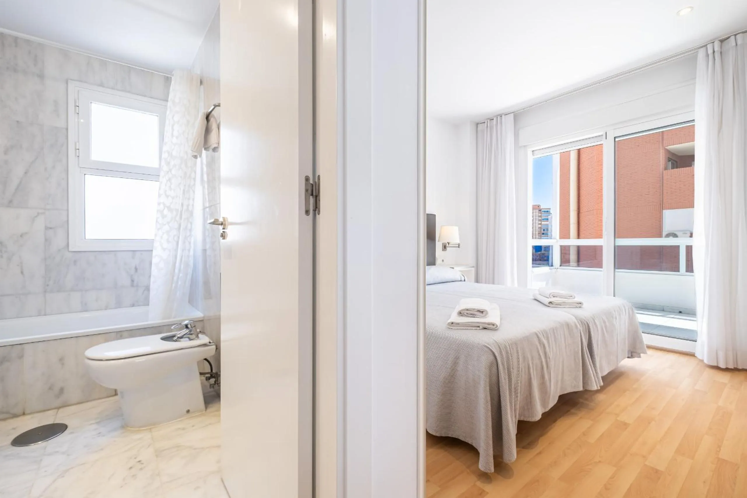 Toilet, Bed in Apartamentos Les Dunes Centro Levante Beach