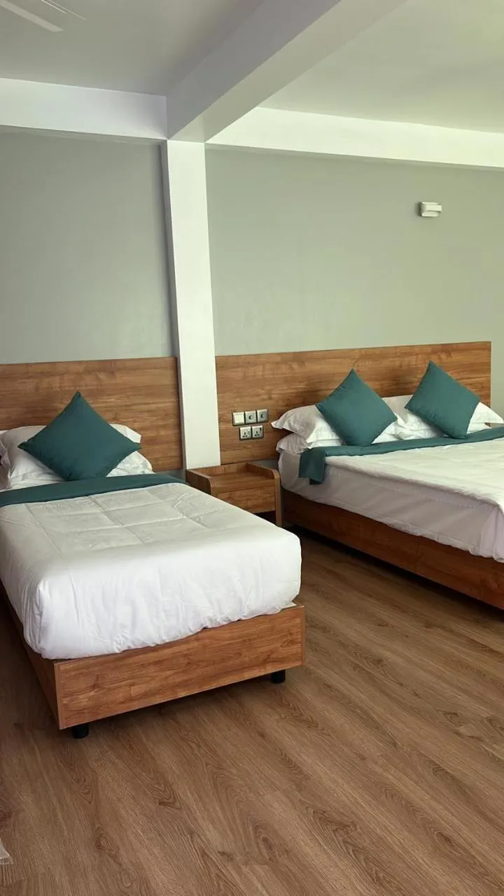 Bed in BAGEECHAA STAY