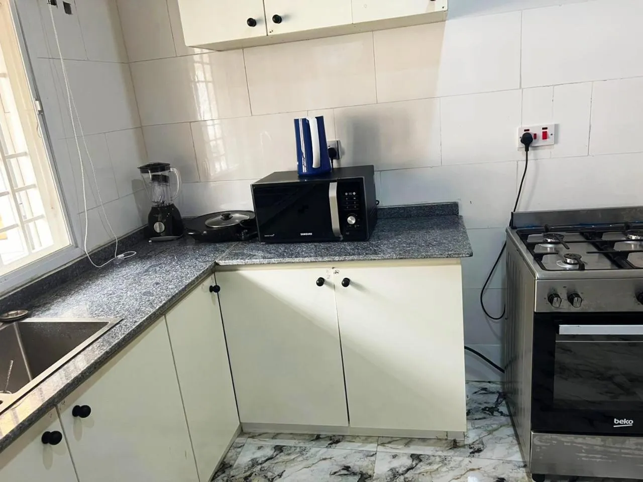 Kitchen or kitchenette in Ayinde Homes