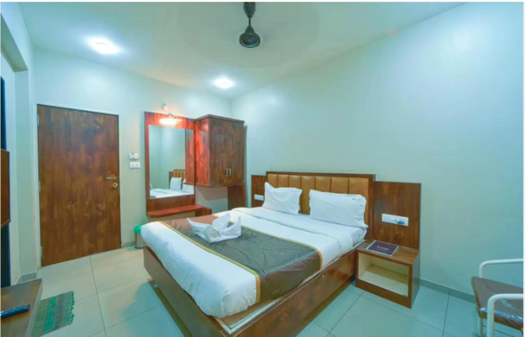 Bed in Hotel Vrindavan Deluxe Kolhapur NEAR CENTRAL BUS STAND