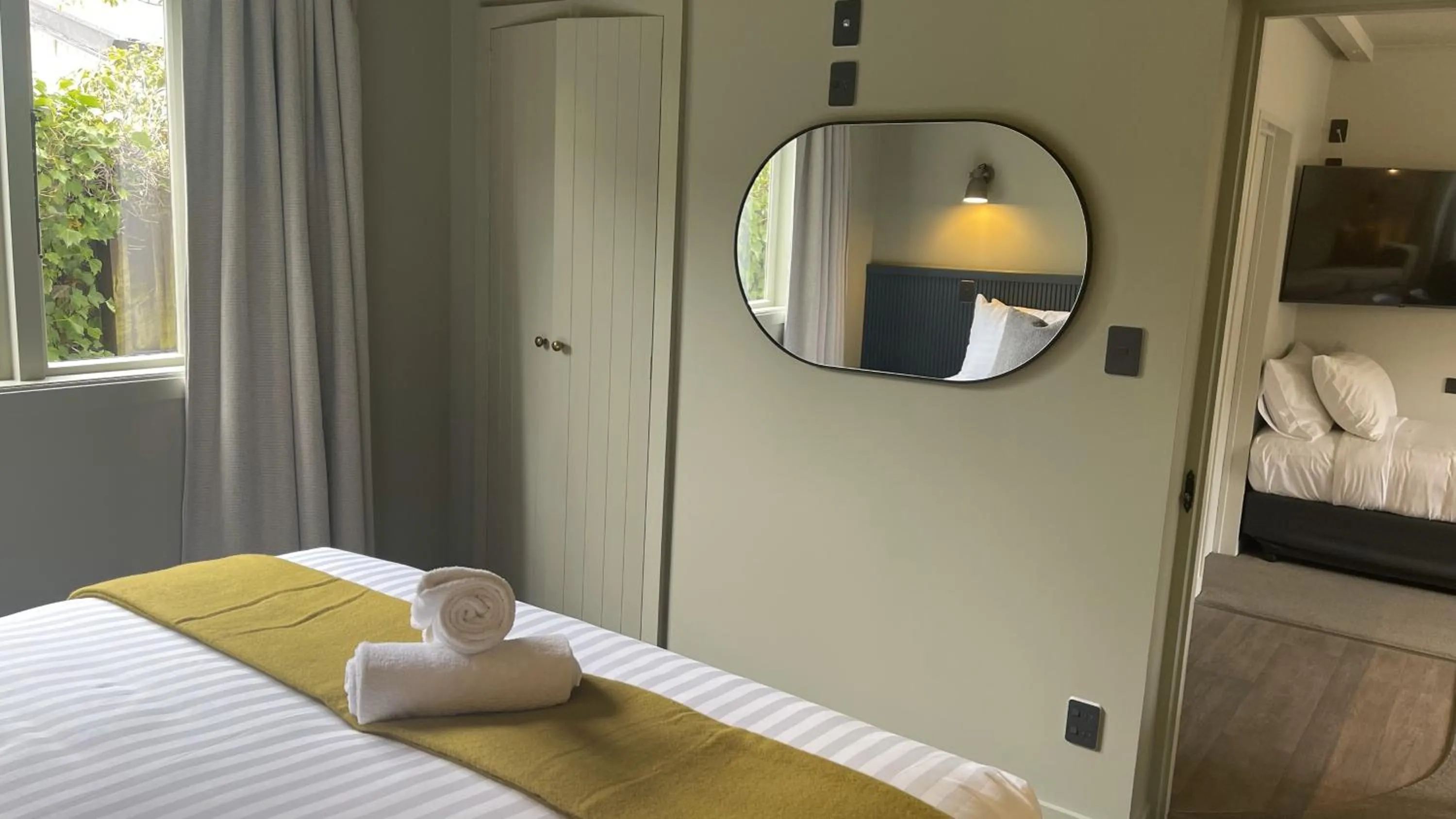 Bed in The Elmwood Motel