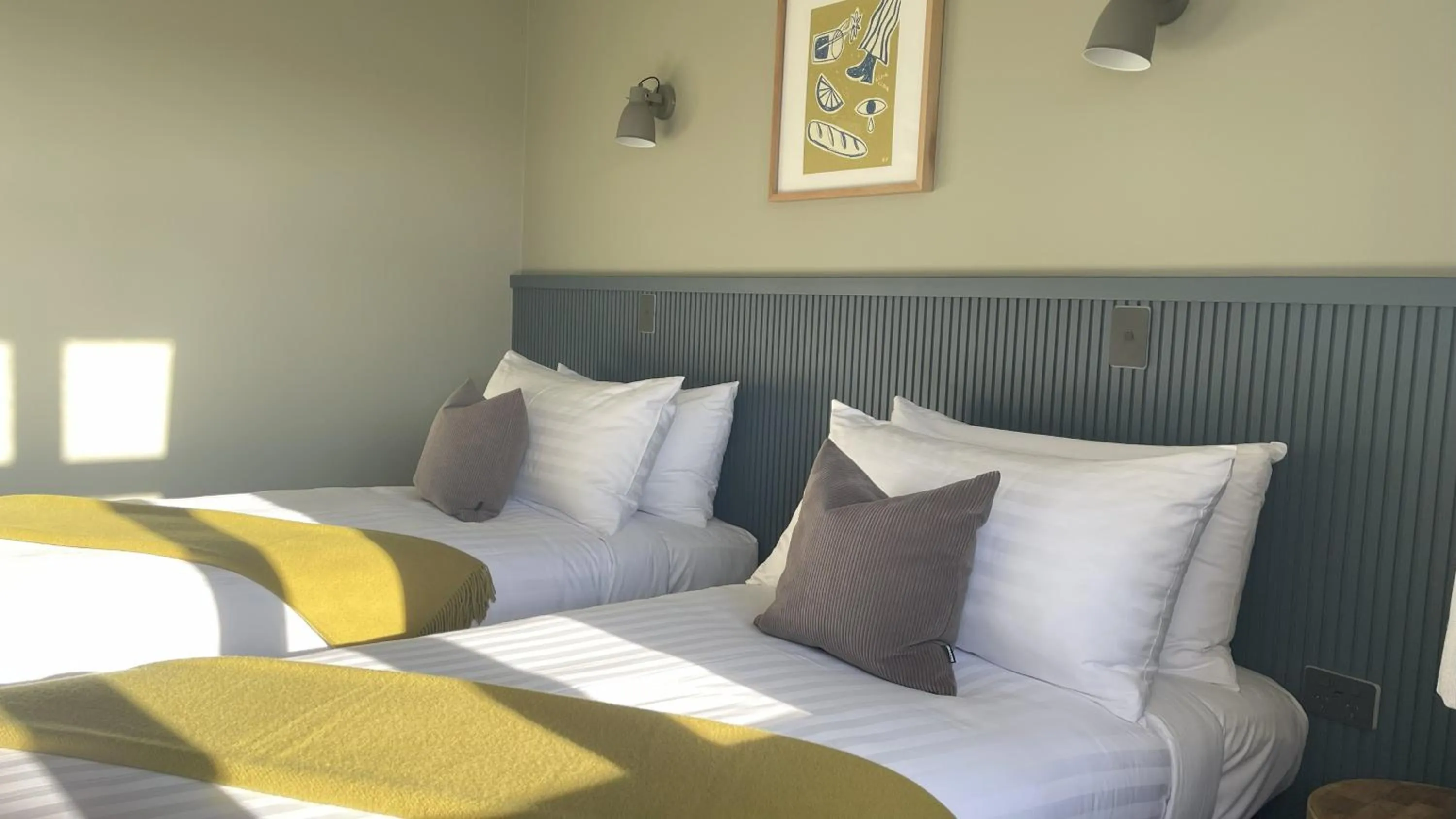 Bed in The Elmwood Motel