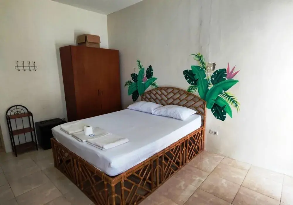 Bed in Bluewaves Resort - Basdaku by Hiverooms Bed in Bluewaves Resort - Basdaku by Hiverooms