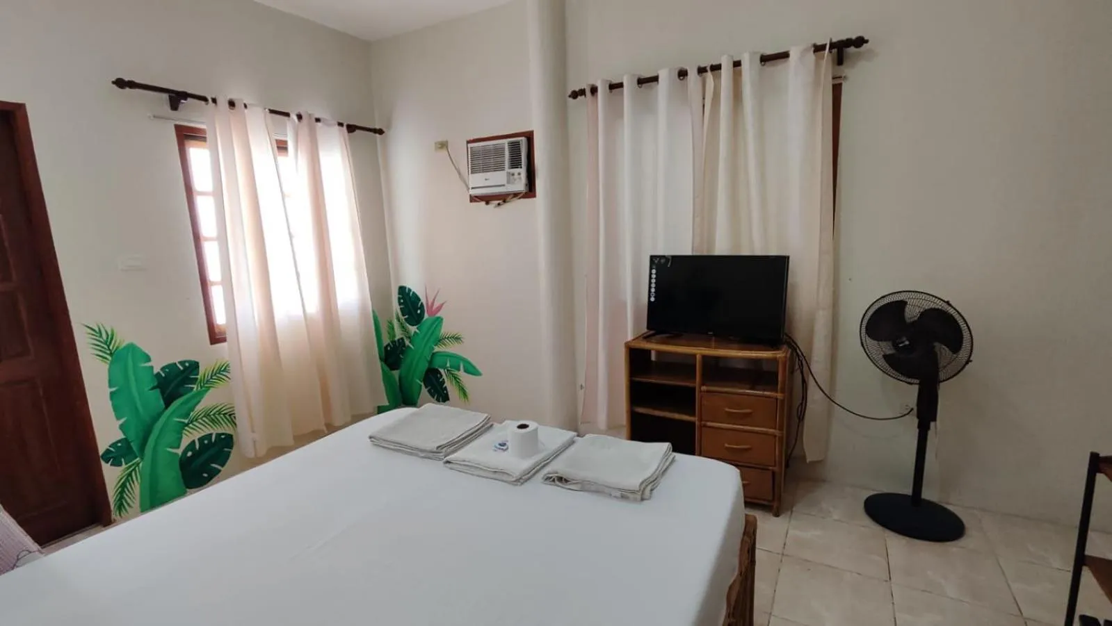 Bedroom, Bed in Bluewaves Resort - Basdaku by Hiverooms