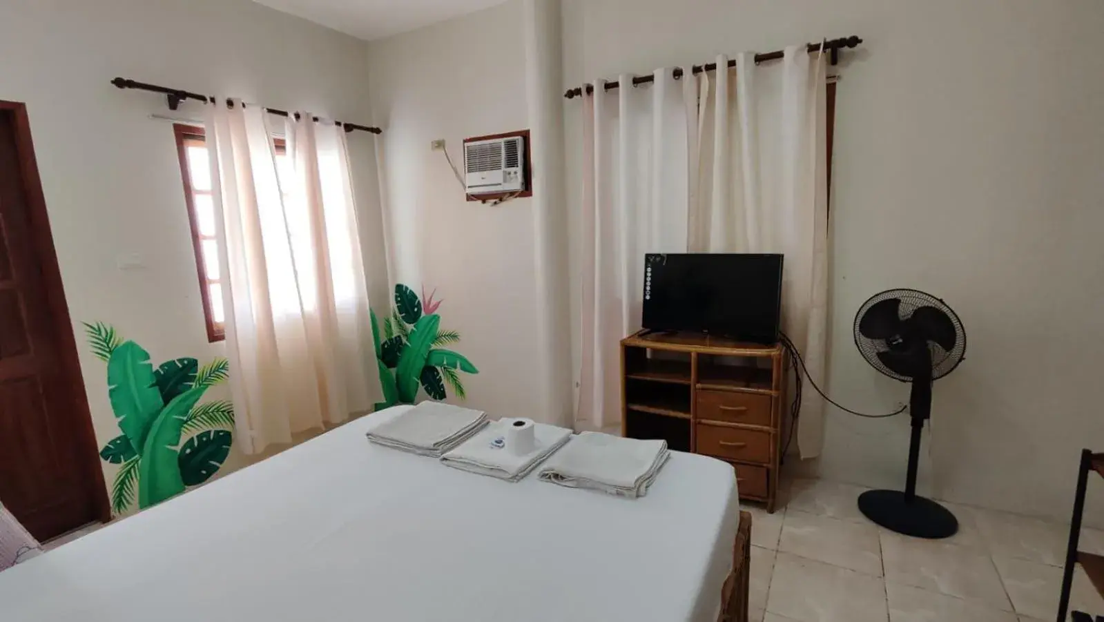 Bedroom, Bed in Bluewaves Resort - Basdaku by Hiverooms Bedroom, Bed in Bluewaves Resort - Basdaku by Hiverooms