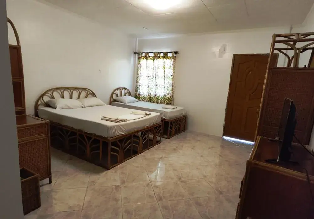 Bedroom, Bed in Bluewaves Resort - Basdaku by Hiverooms Bedroom, Bed in Bluewaves Resort - Basdaku by Hiverooms