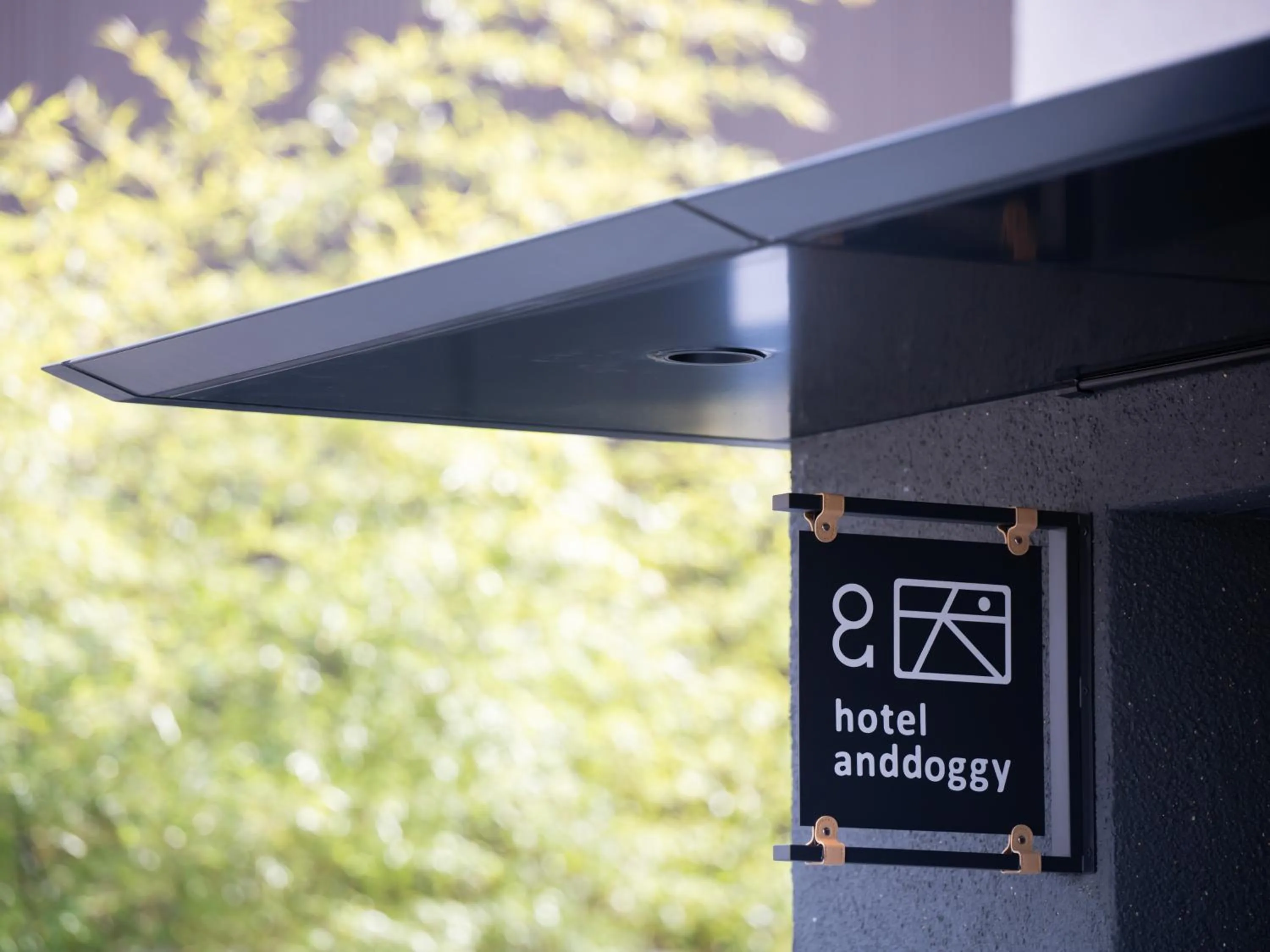 Property logo or sign in hotel anddoggy Kyoto Nijo